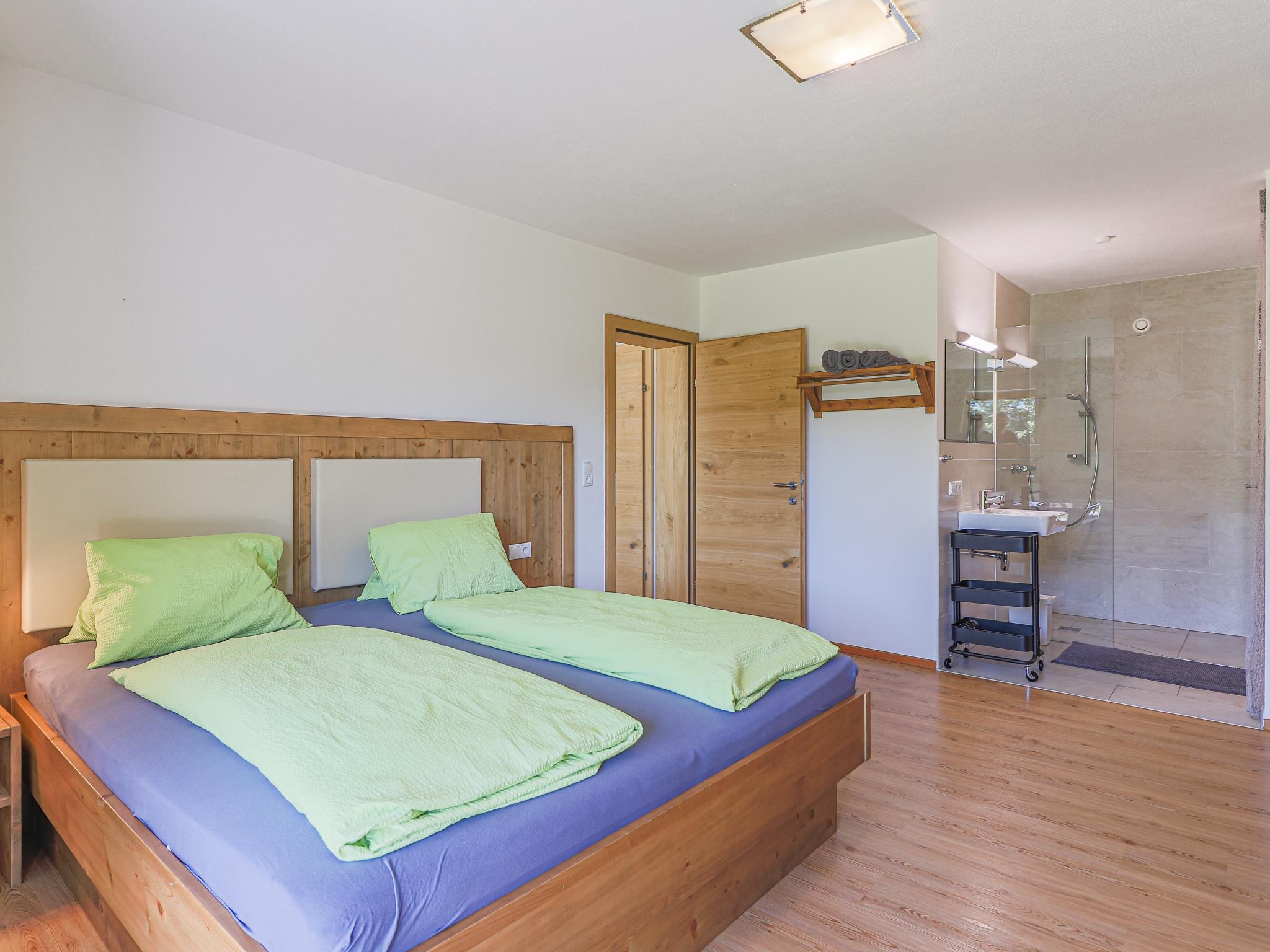 Bedroom with comfortable beds at Ferienhaus Rabl in Itter