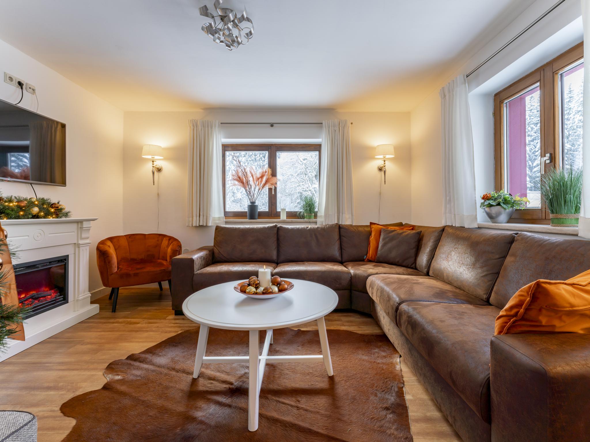 Bedroom with comfortable beds at Neva S Saalbach in Saalbach-Hinterglemm