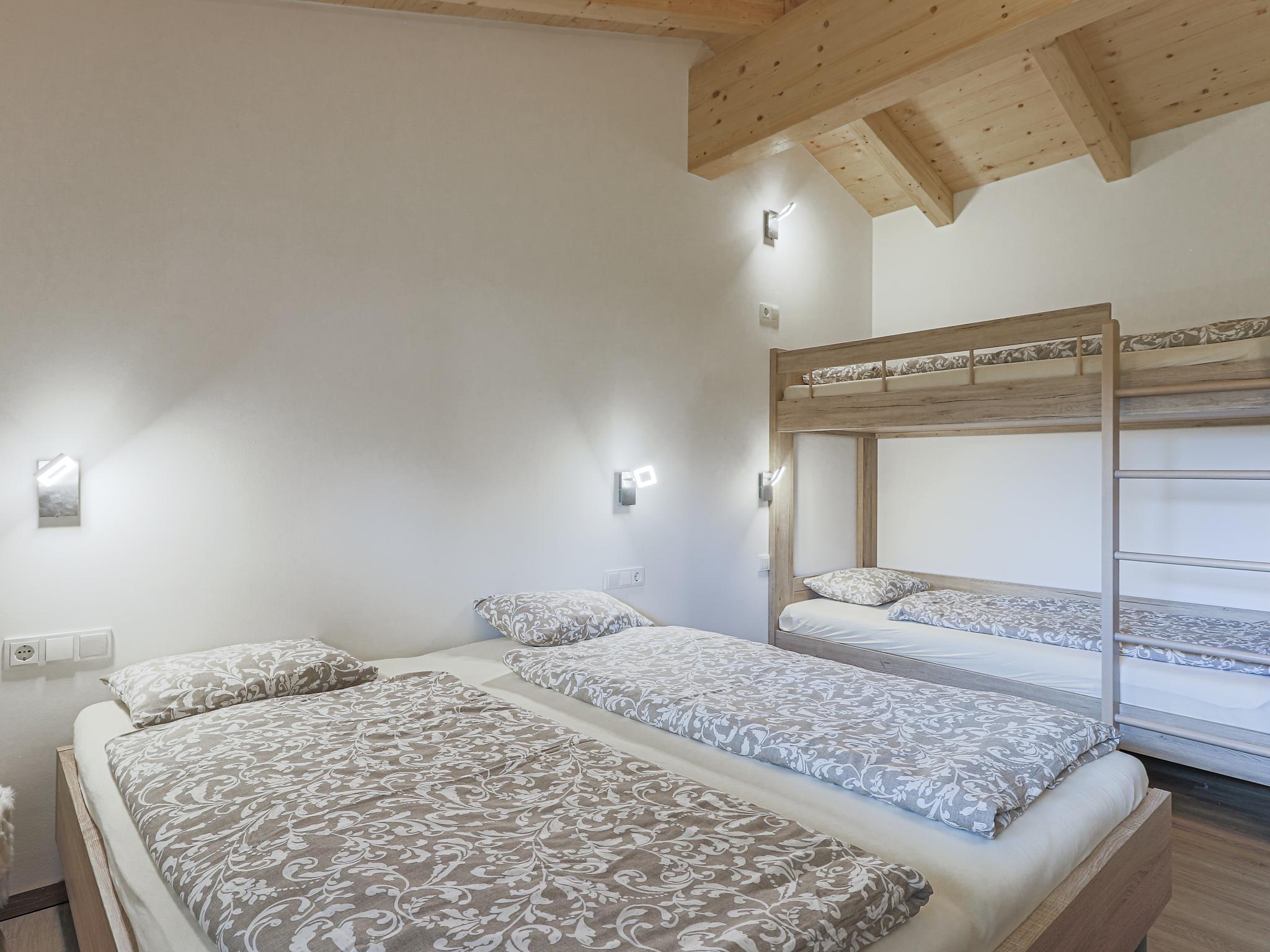 Bedroom with comfortable beds at Michelle Top 1 in Bramberg am Wildkogel