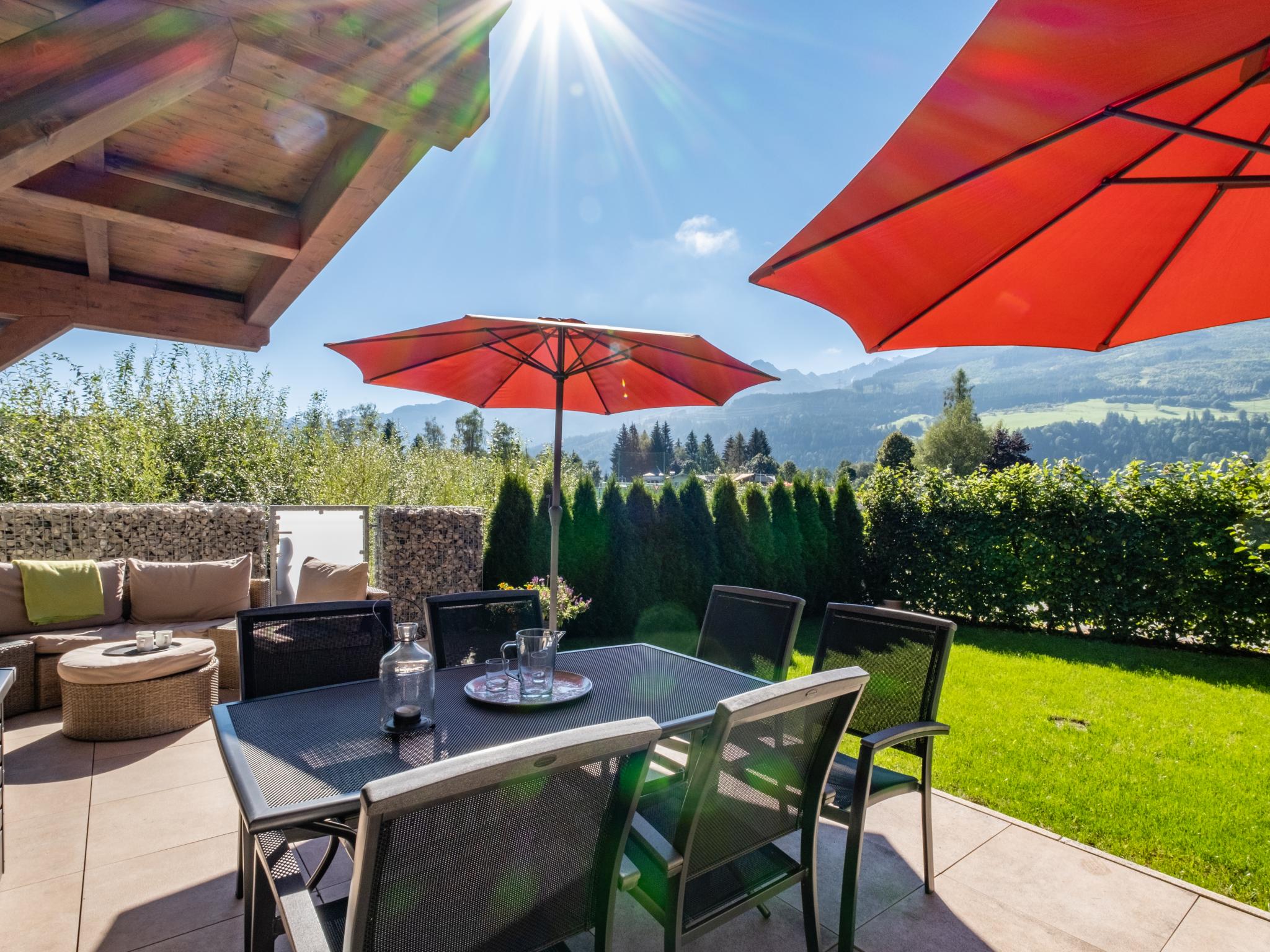 Bedroom with comfortable beds at Sonnen Lodge Kaprun in Piesendorf