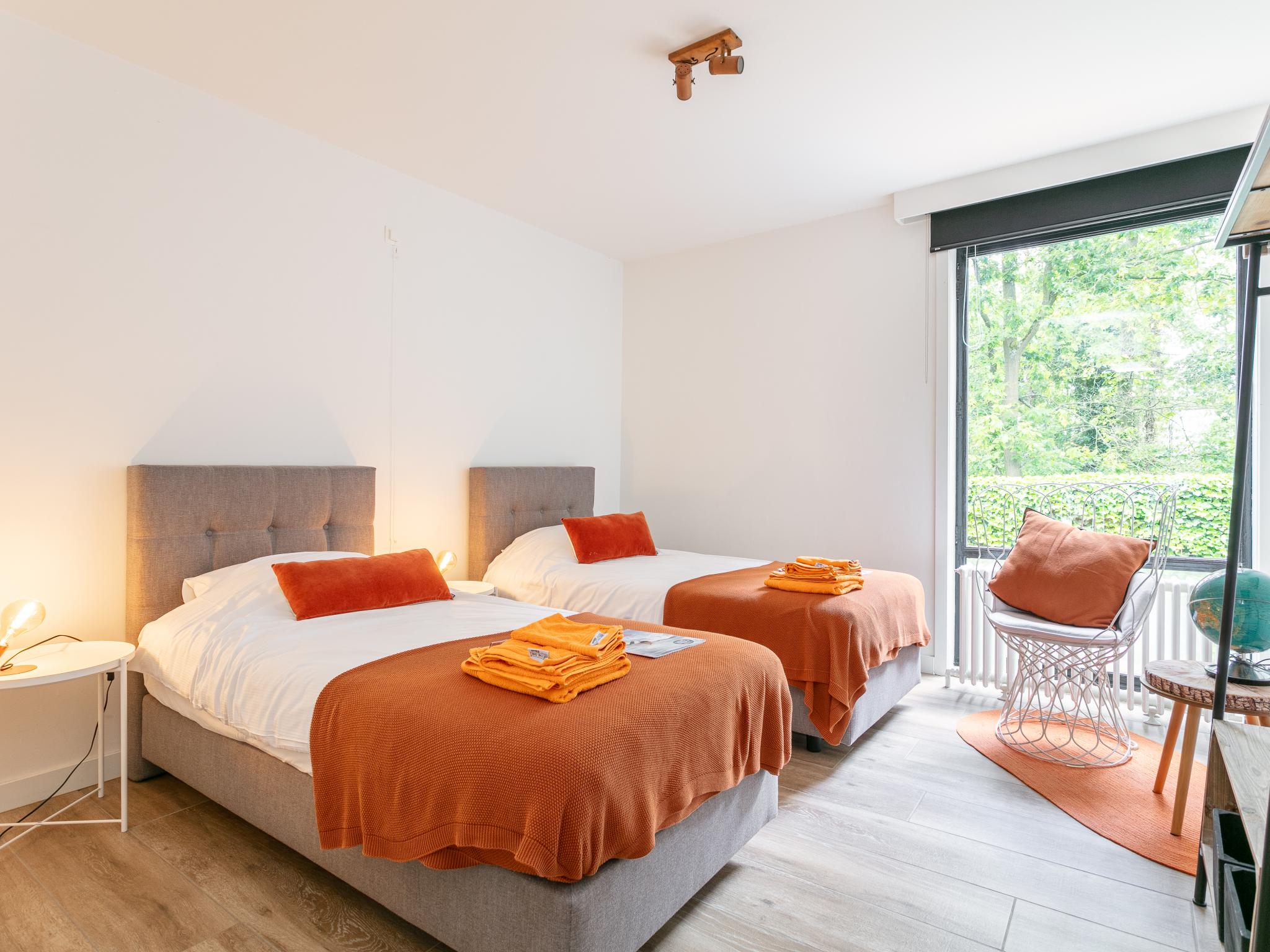 Swimming pool area at Maison Clement in Maasmechelen