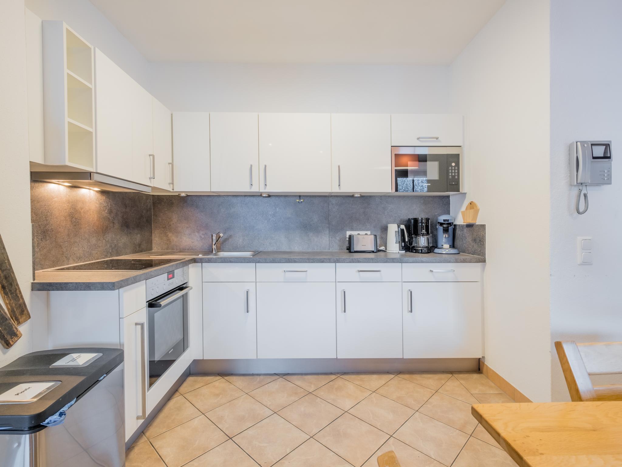 Bedroom with comfortable beds at Alpensteinbock Saalbach C in Saalbach-Hinterglemm