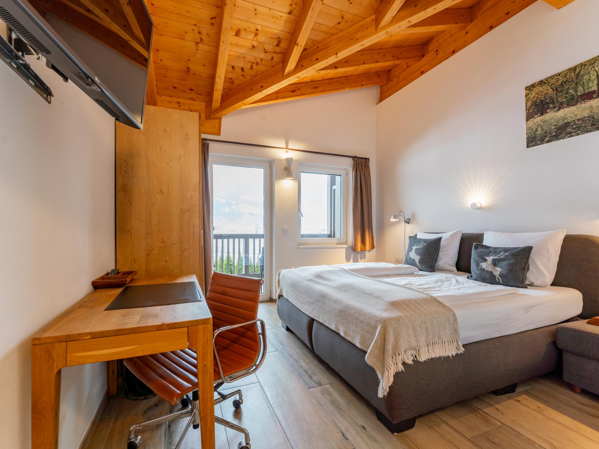 Swimming pool area at Salzach Lodge in Piesendorf