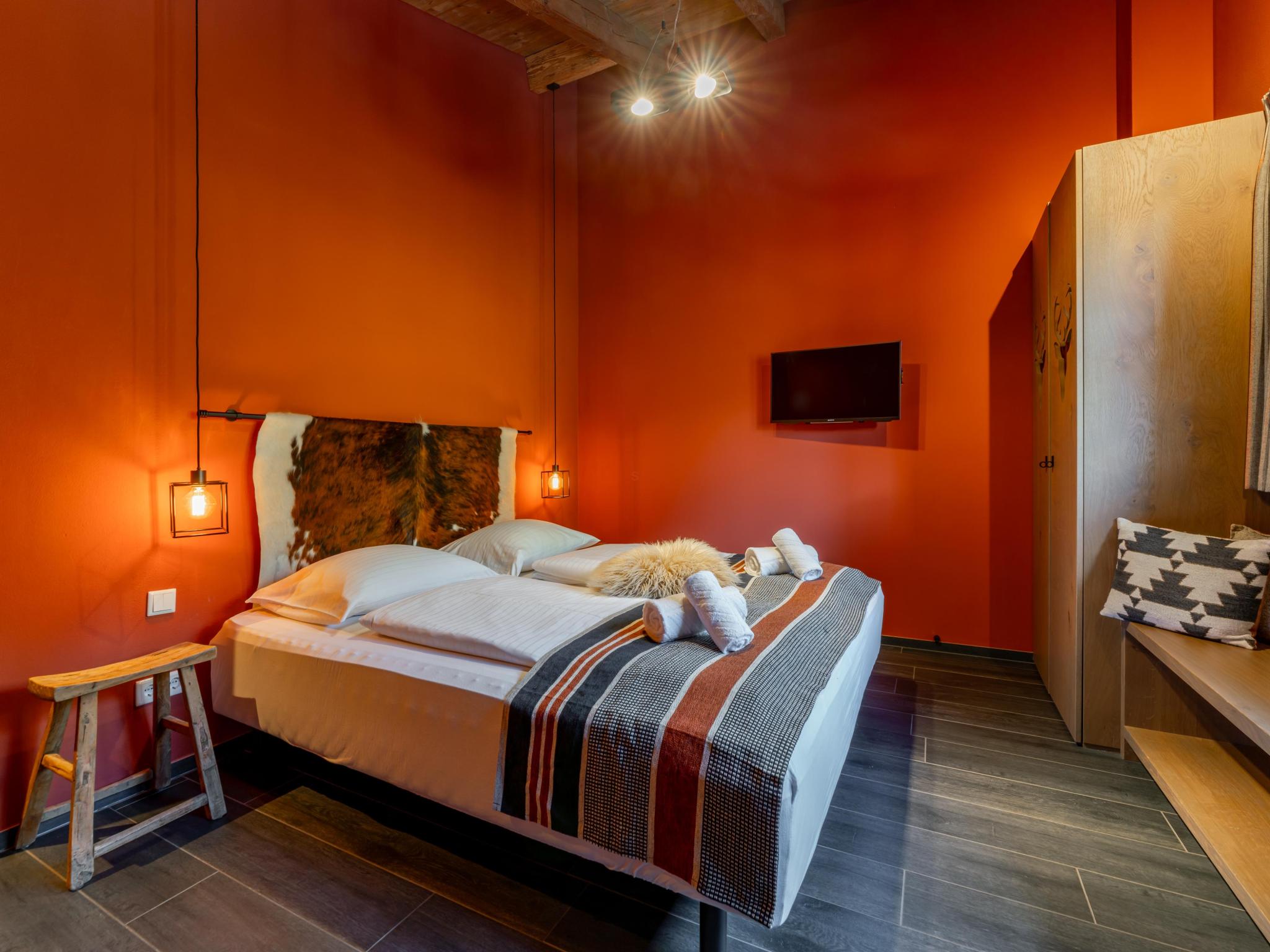 Bedroom with comfortable beds at Chalet Schneelöwe S in Leogang