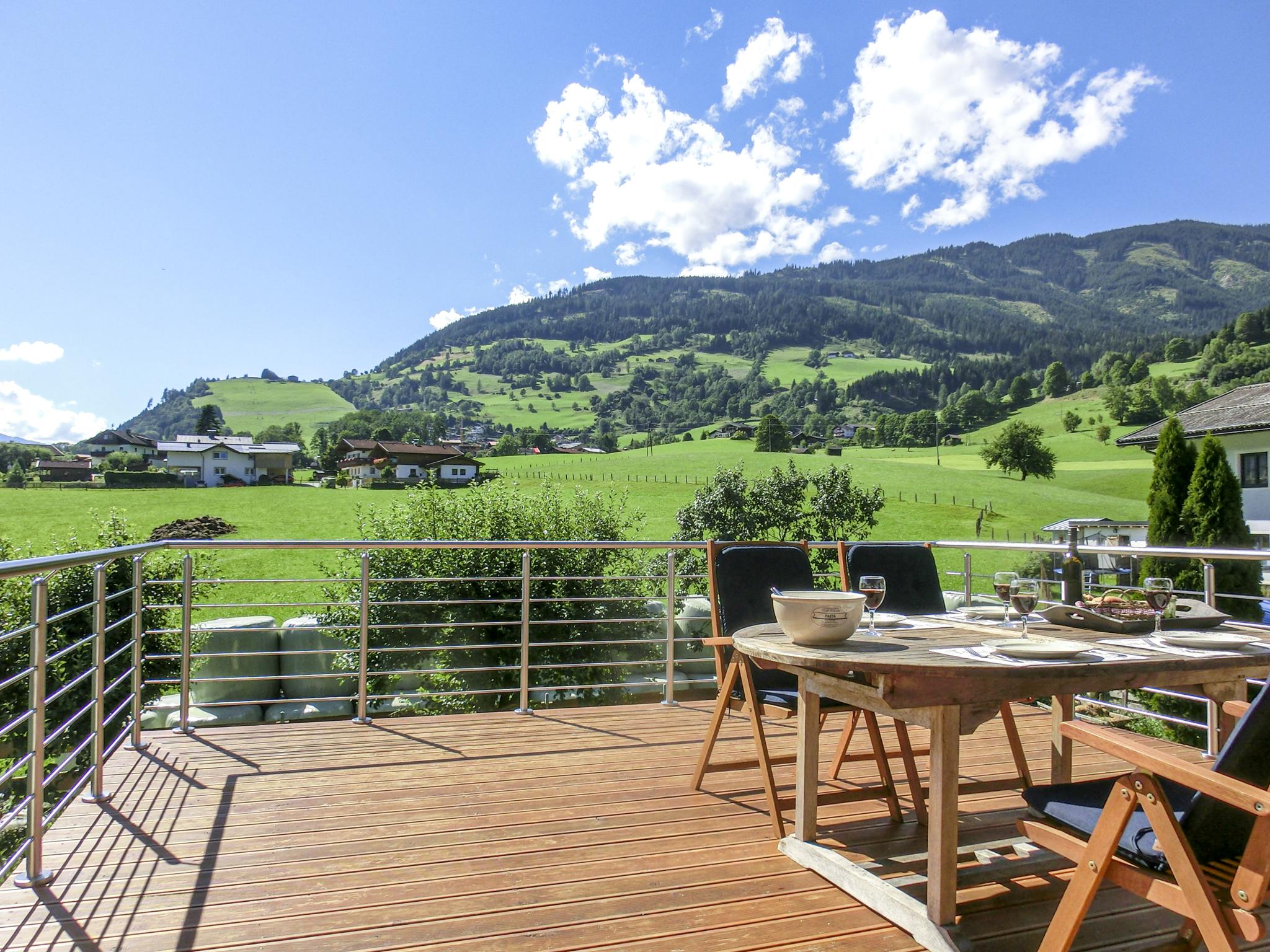 Outdoor terrace and views at Tauernhaus Madelief in Piesendorf