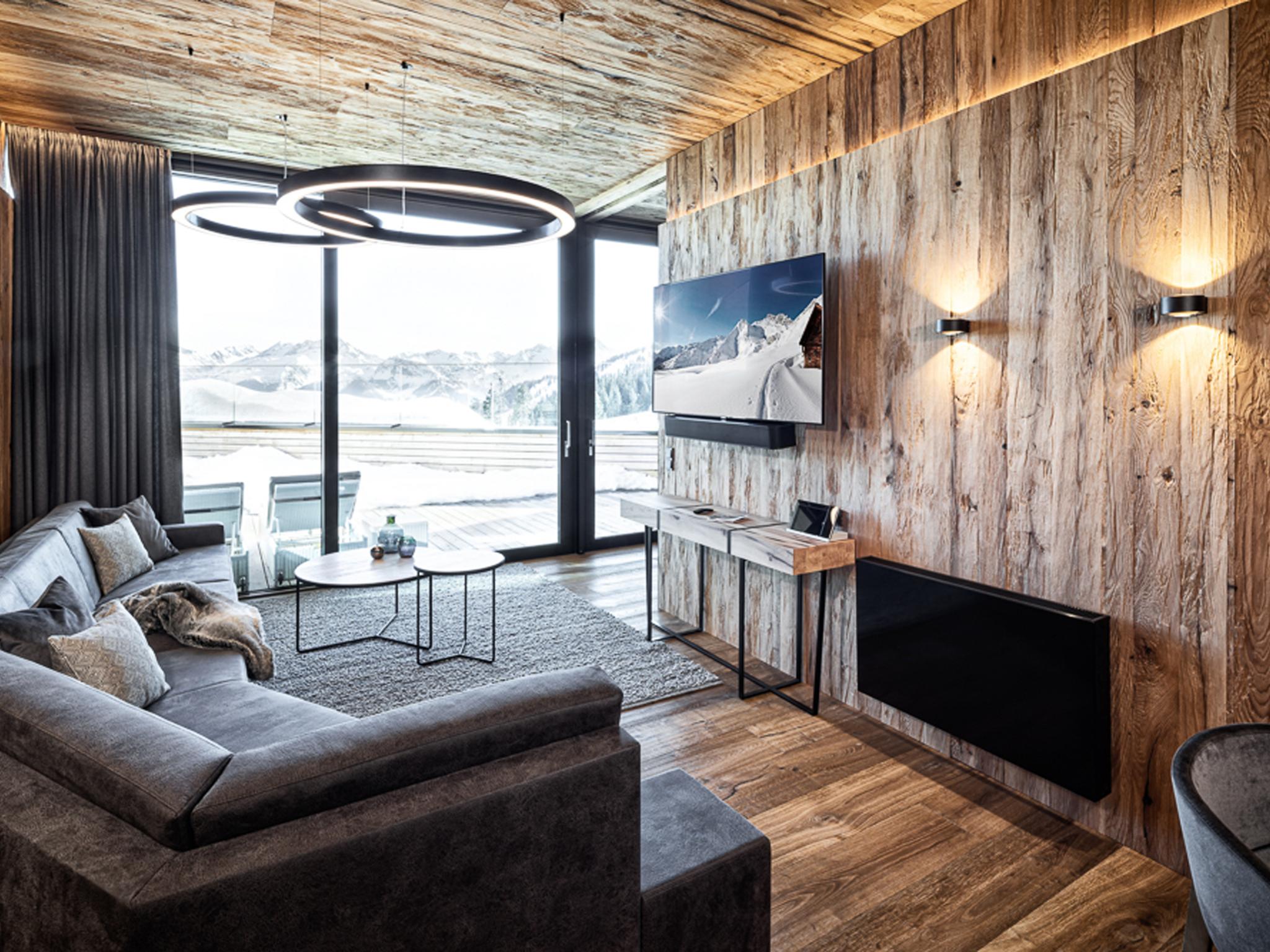 Bedroom with comfortable beds at Mountain View Loft Granat in Kaltenbach