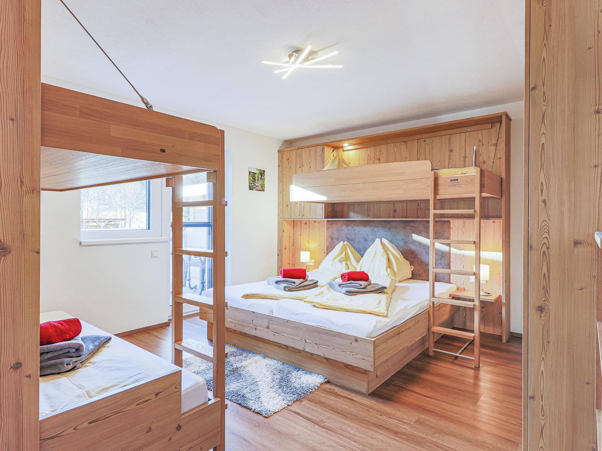 Bedroom with comfortable beds at Krammer Großvenediger in Neukirchen am Großvenediger