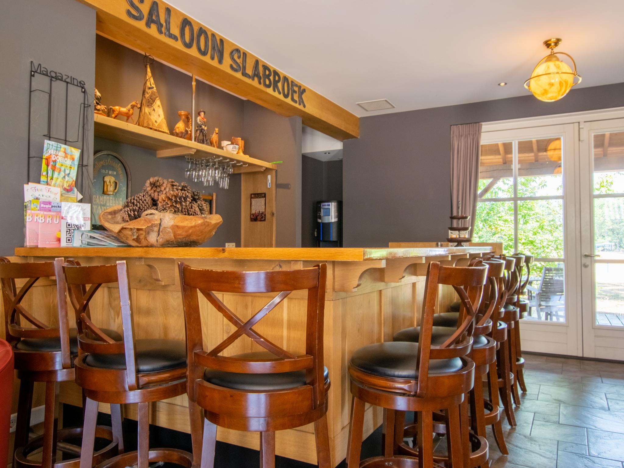 Swimming pool area at Lodge Slabroek in Uden