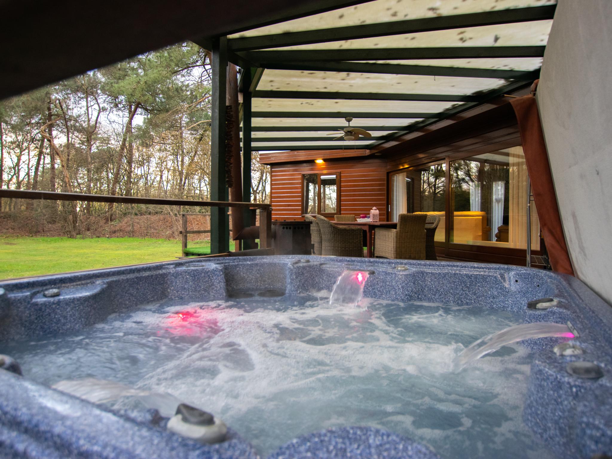Bedroom with comfortable beds at Villa Maashorst in Uden
