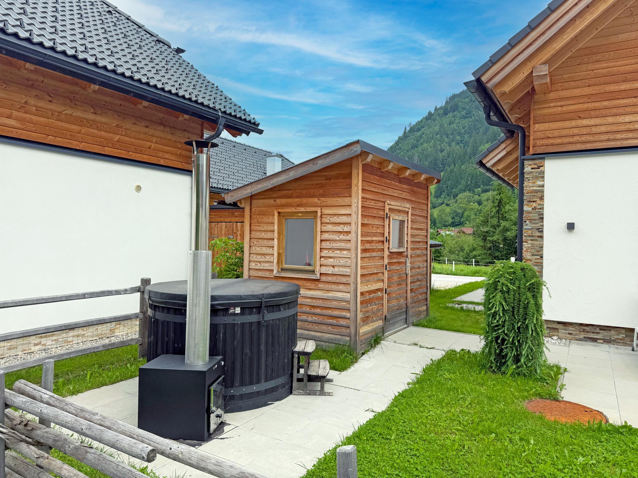 Bedroom with comfortable beds at Donnersbach Lodge in Donnersbachwald