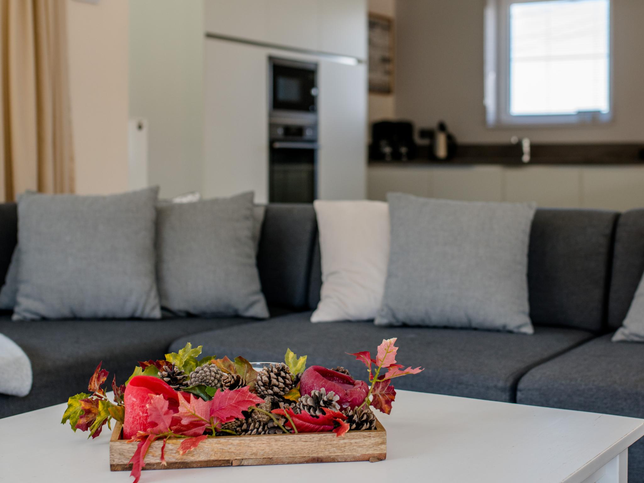 Swimming pool area at Coq au lit in De Haan