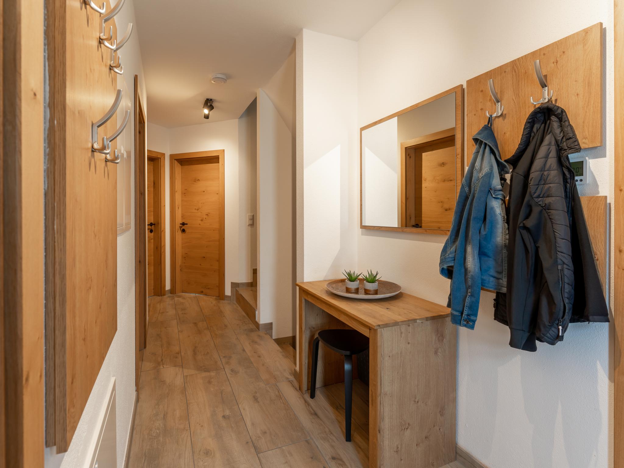 Bedroom with comfortable beds at Tauernlodge Krimml 2B in Krimml