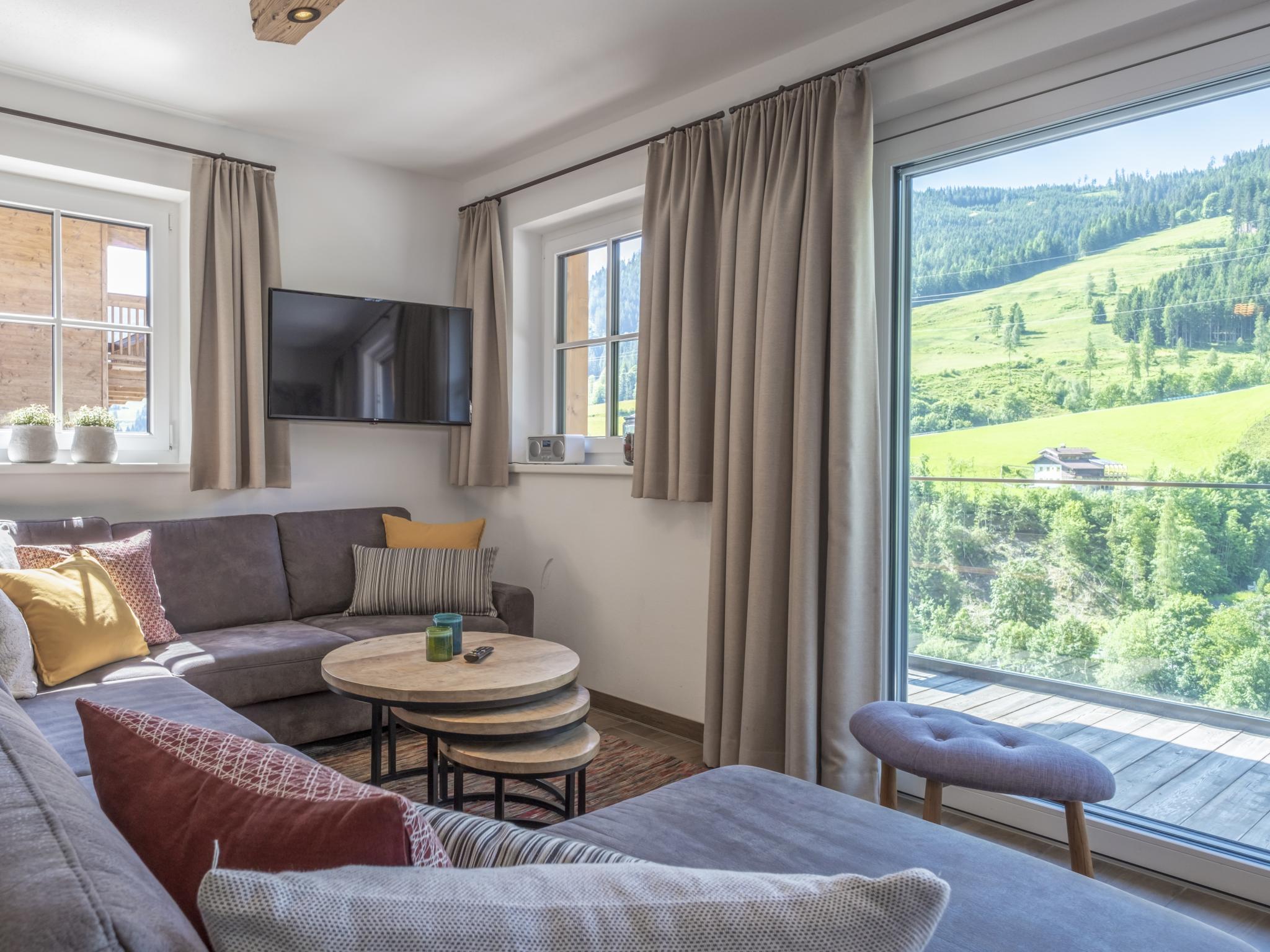 Bedroom with comfortable beds at Alpen Villa Danica in Mühlbach am Hochkönig