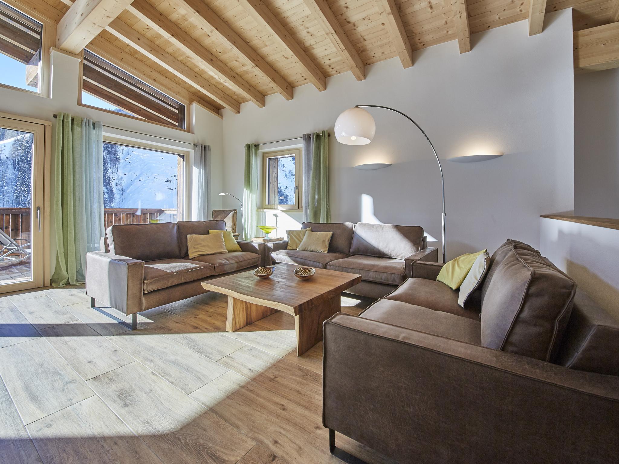 Bedroom with comfortable beds at Künstler Chalet in Saalbach-Hinterglemm