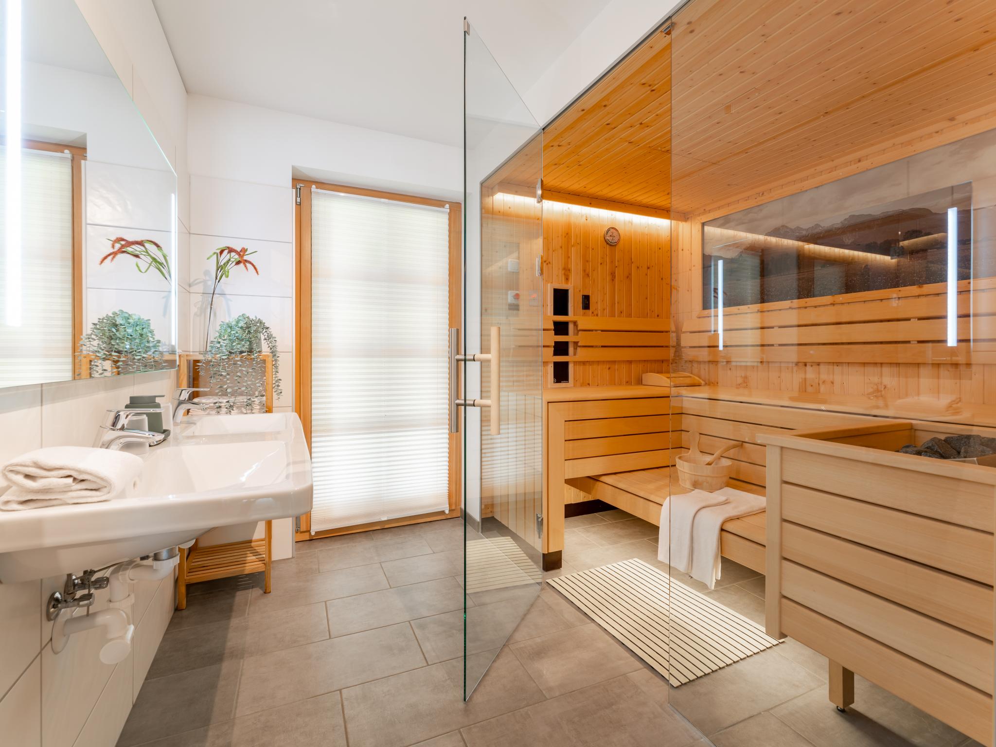 Bedroom with comfortable beds at Chalet Amsel in Donnersbachwald