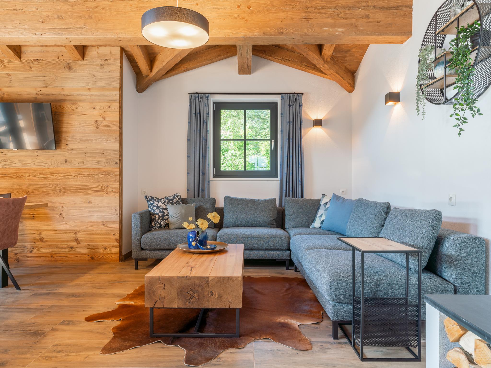 Bedroom with comfortable beds at Chalet Joep in Wald im Pinzgau