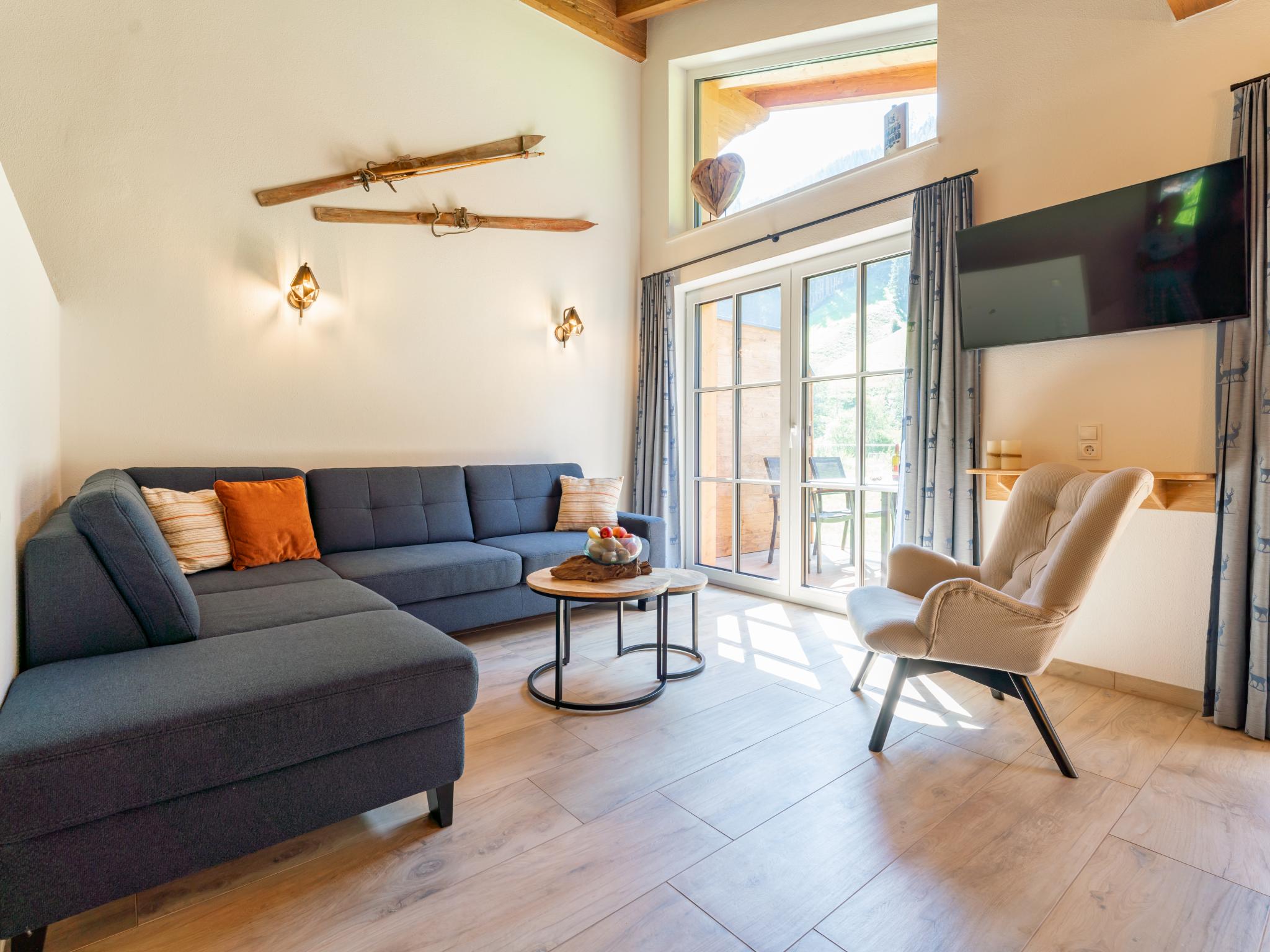 Bedroom with comfortable beds at Chalet Astrid in Wald im Pinzgau