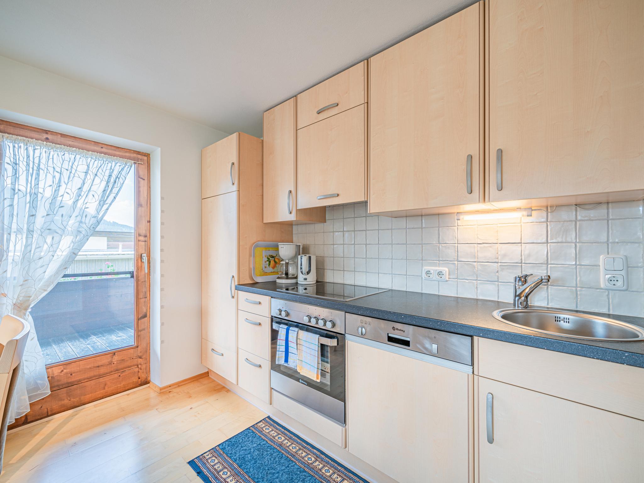 Bedroom with comfortable beds at Chalet Josef in Westendorf