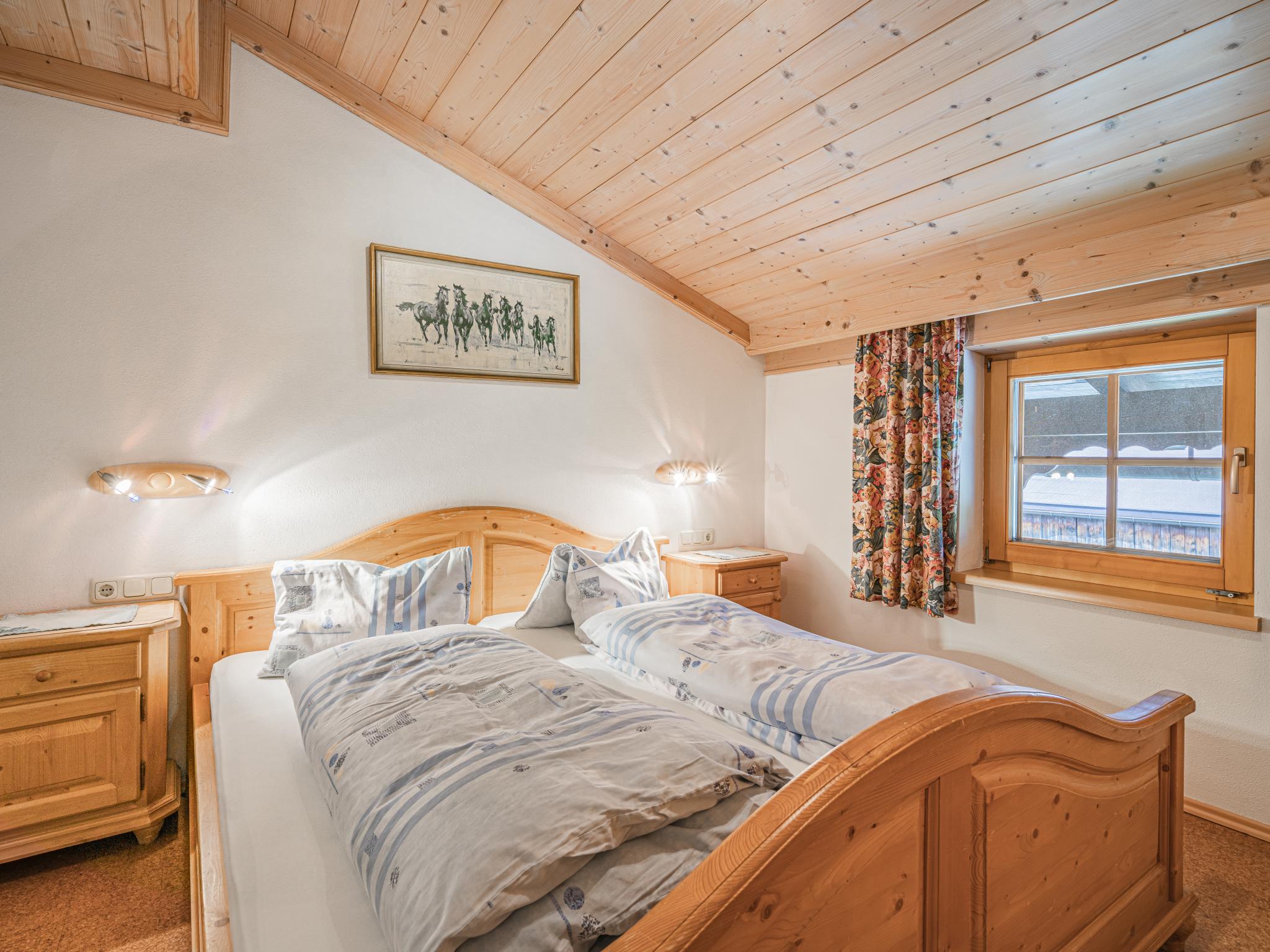 Bedroom with comfortable beds at Weberhof Top 5 in Brixen im Thale