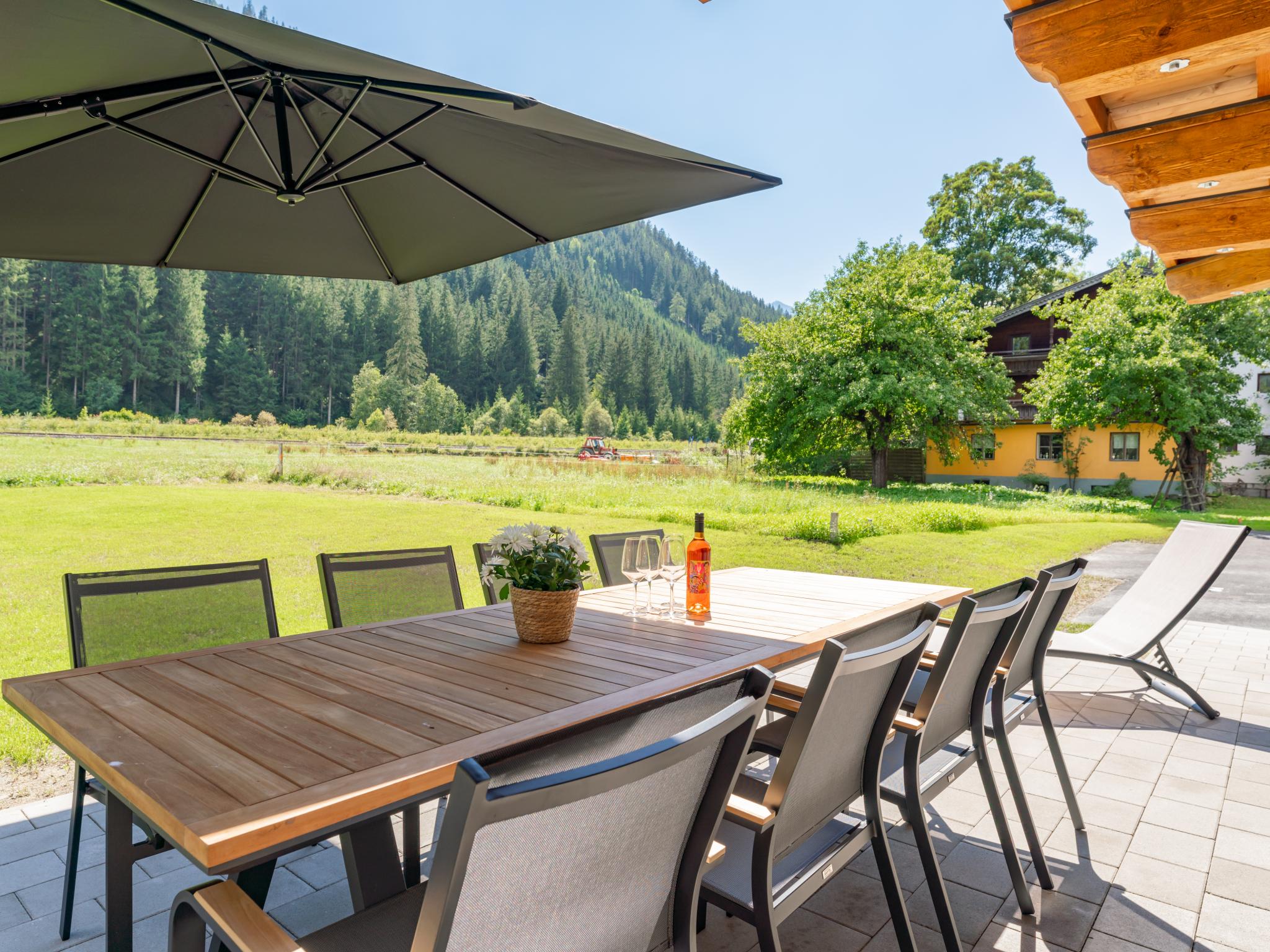 Bedroom with comfortable beds at Pinzgau Lodge 1A in Wald im Pinzgau