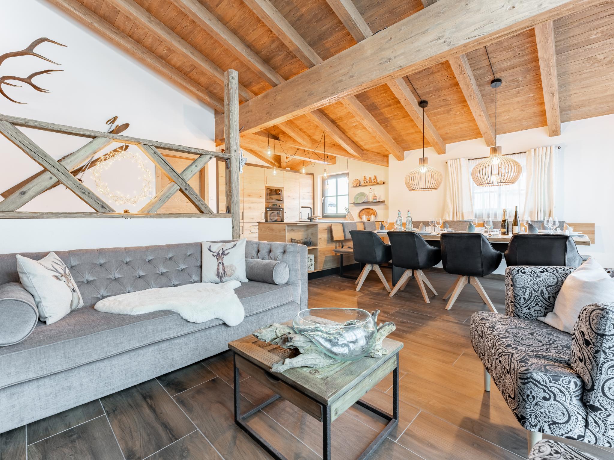 Bedroom with comfortable beds at Tauernlodge Carpe Diem in Niedernsill