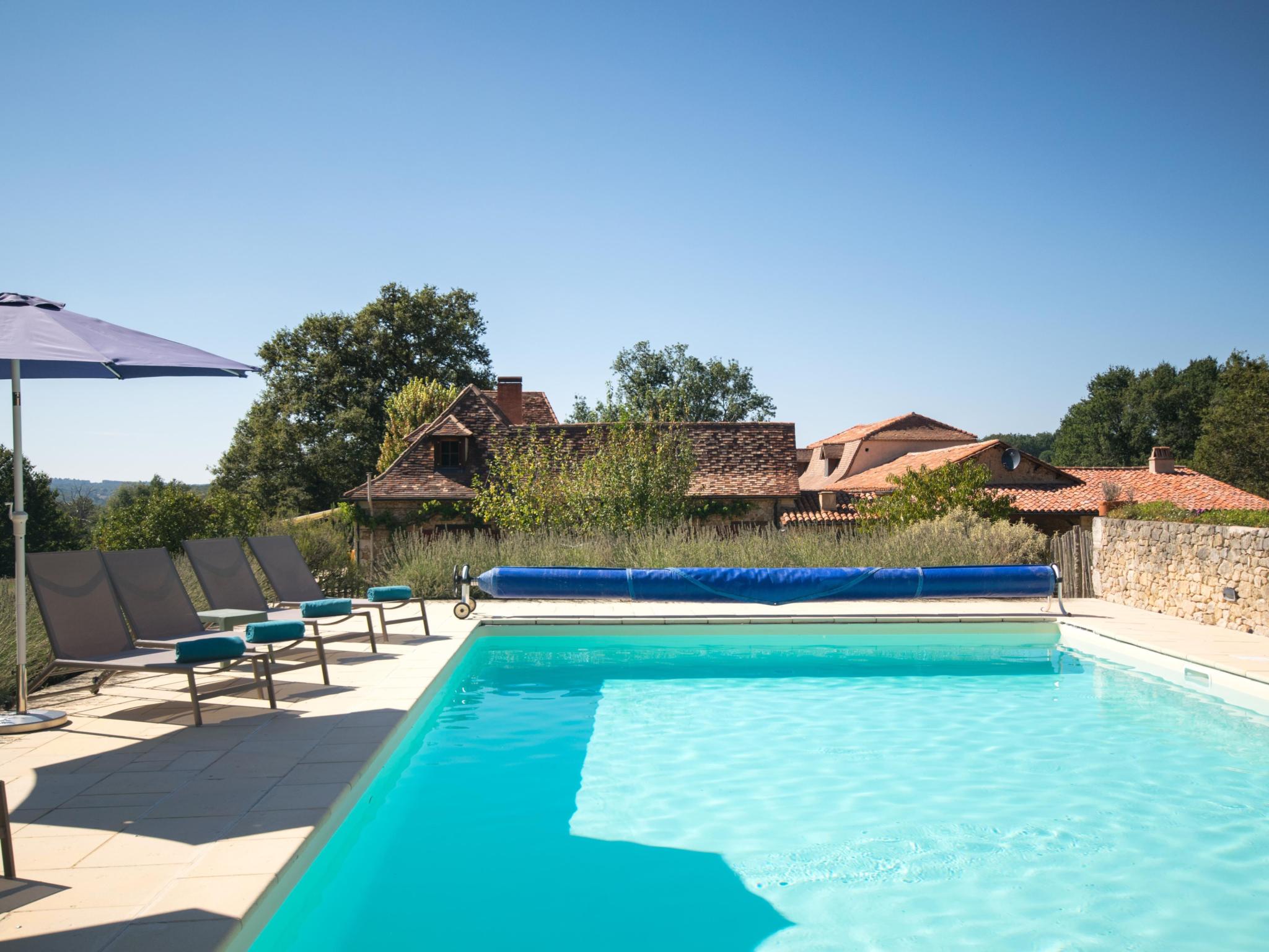 Outdoor terrace and views at Le Grand Gapard 24 pers in Issac