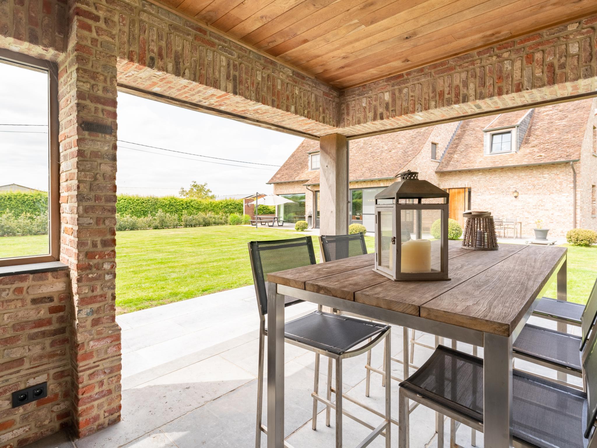 Swimming pool area at Villa Meersen in Maldegem