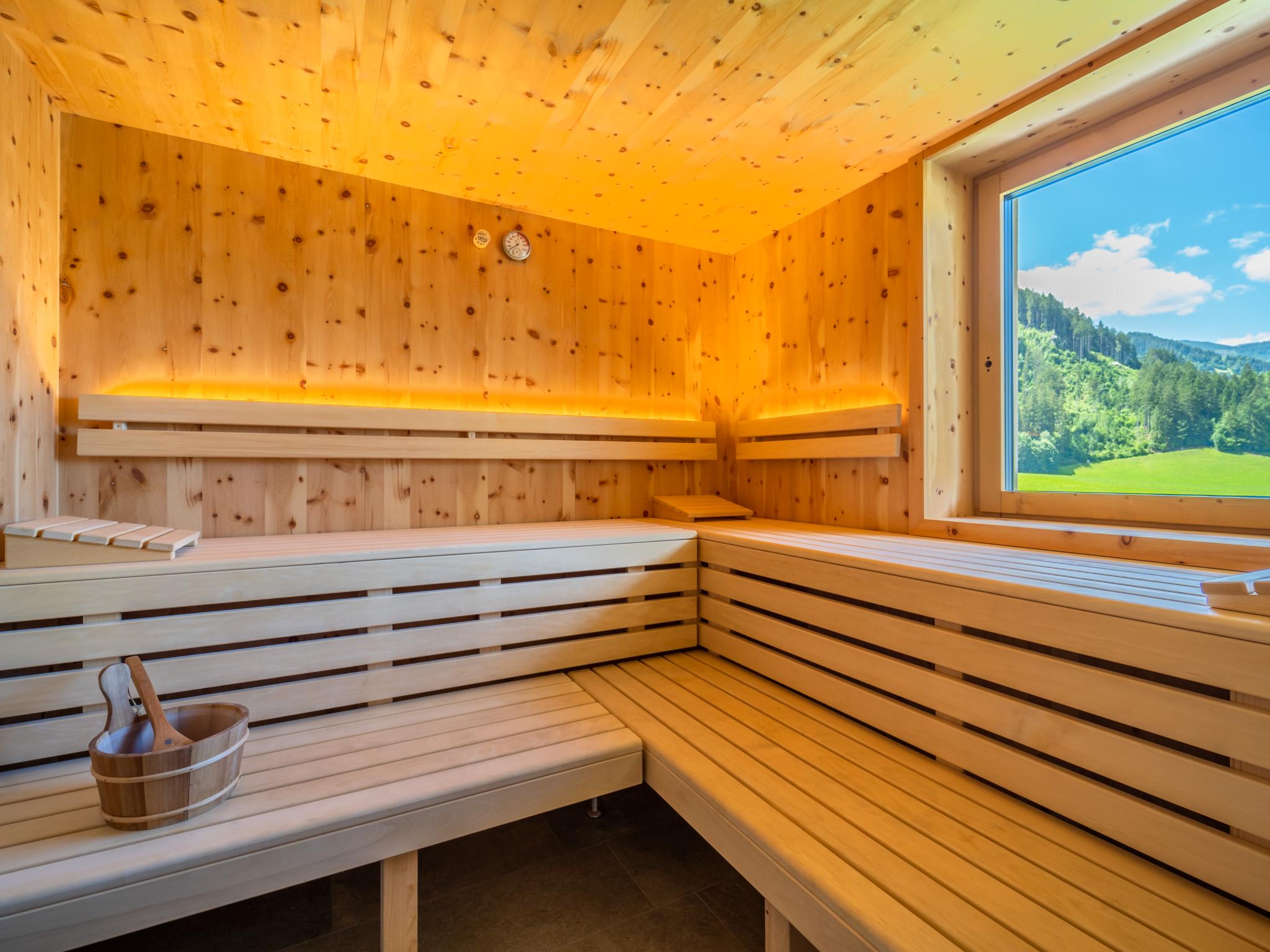 Bedroom with comfortable beds at Chalet Bodahof in Aschau im Zillertal
