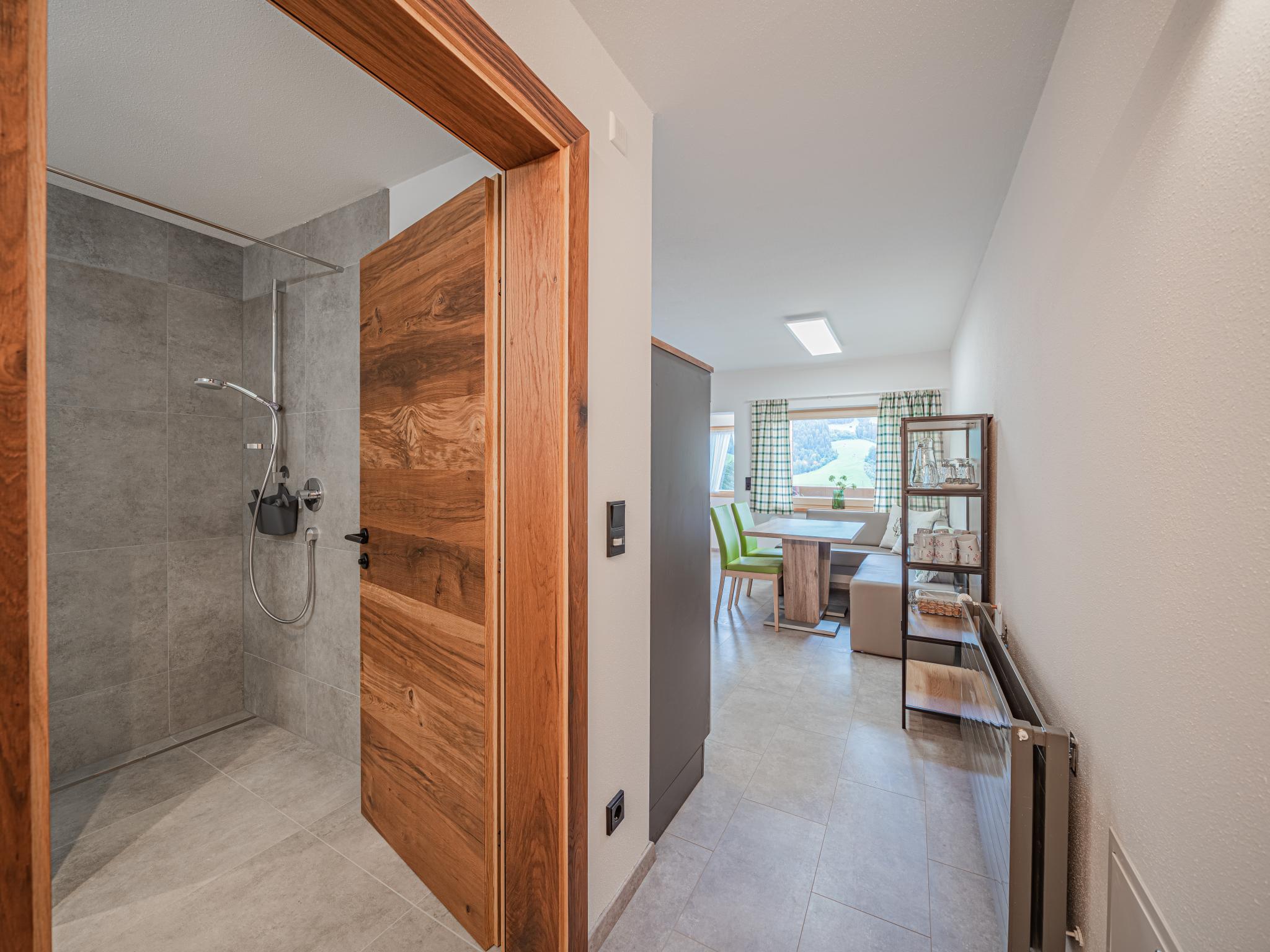 Bedroom with comfortable beds at Hohe Salve XL in Hopfgarten im Brixental