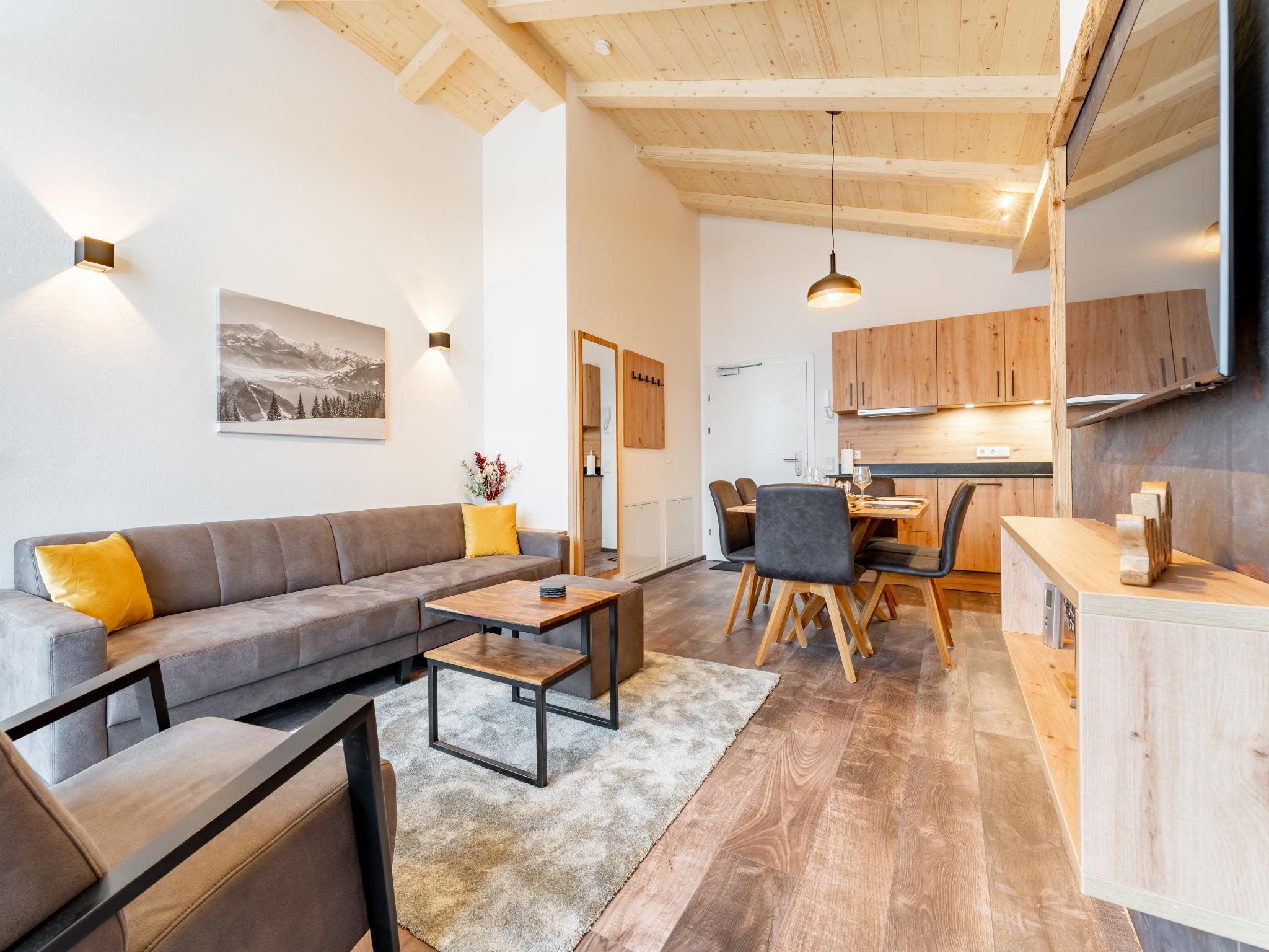 Bedroom with comfortable beds at Falken Suites TOP 8 in Kaprun