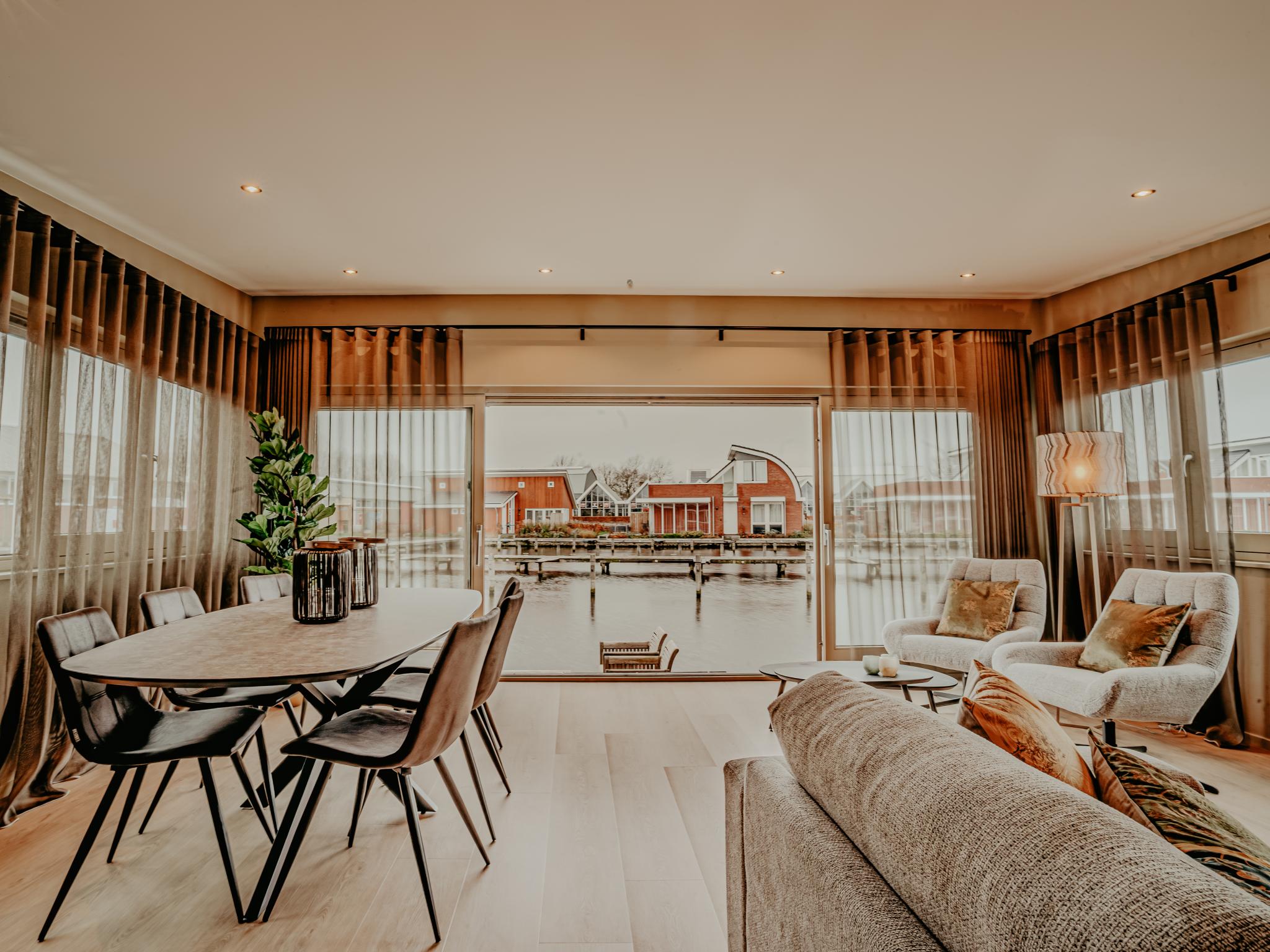 Bedroom with comfortable beds at Woonark De Woude in Uitgeest