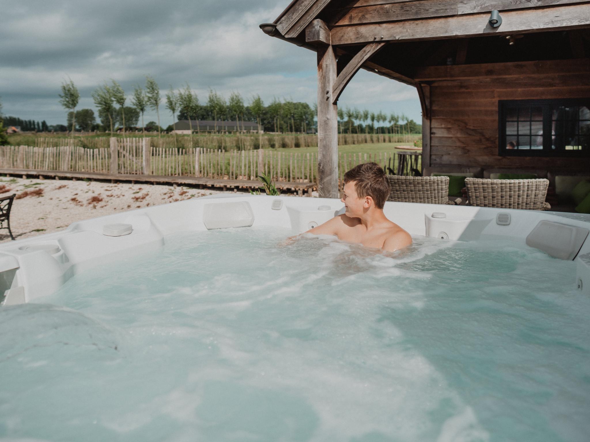 Swimming pool area at Villa Noortem in Maldegem