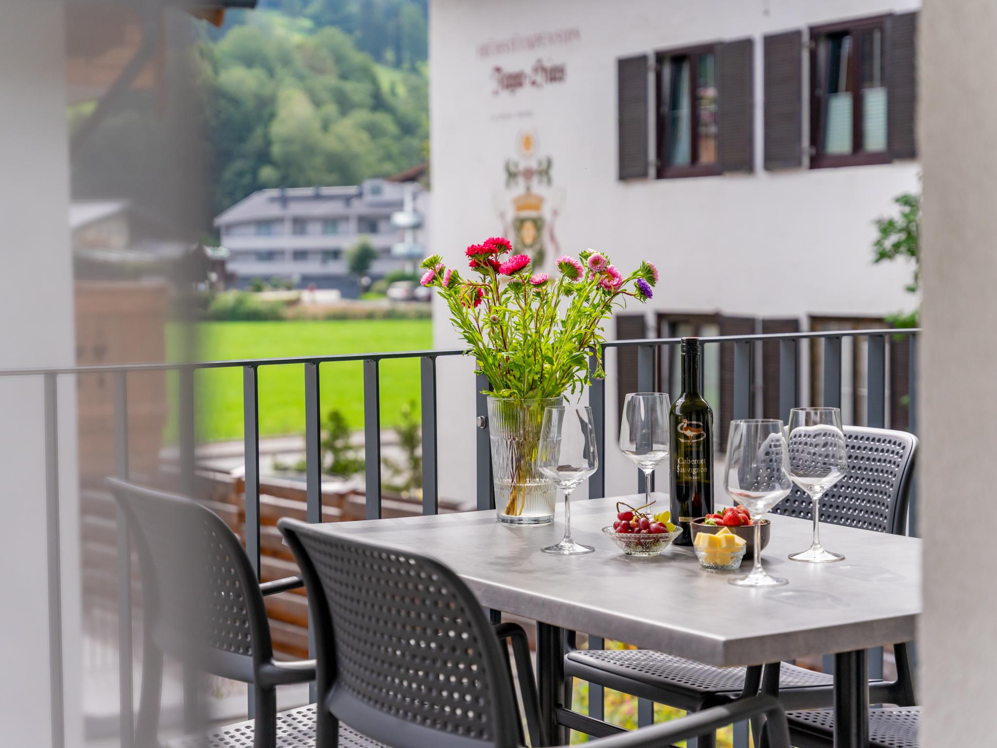 Bedroom with comfortable beds at Falken Suites TOP 4 in Kaprun
