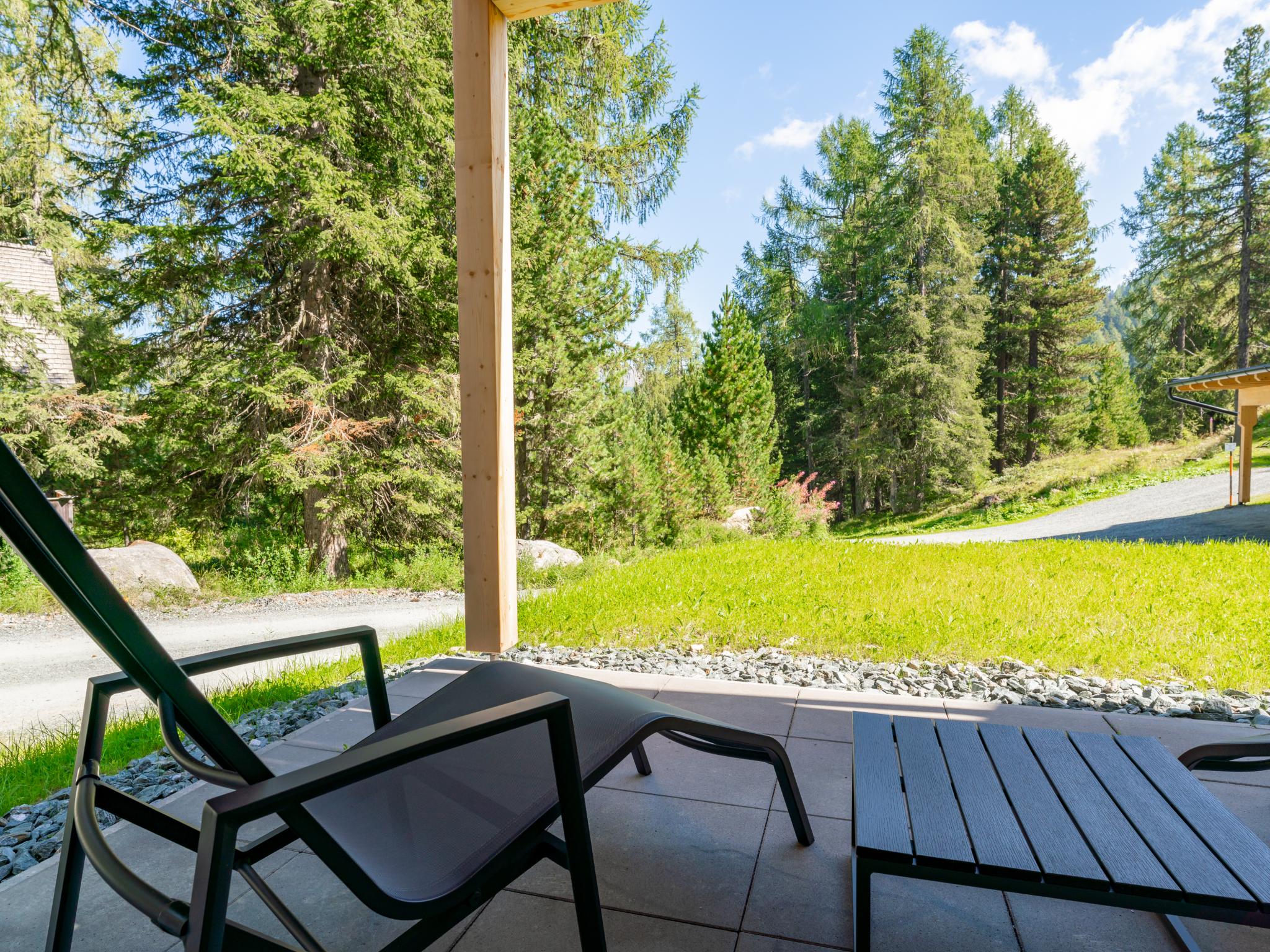 Bedroom with comfortable beds at Alpinchique 3 Mountain Chalet in Turracher Höhe