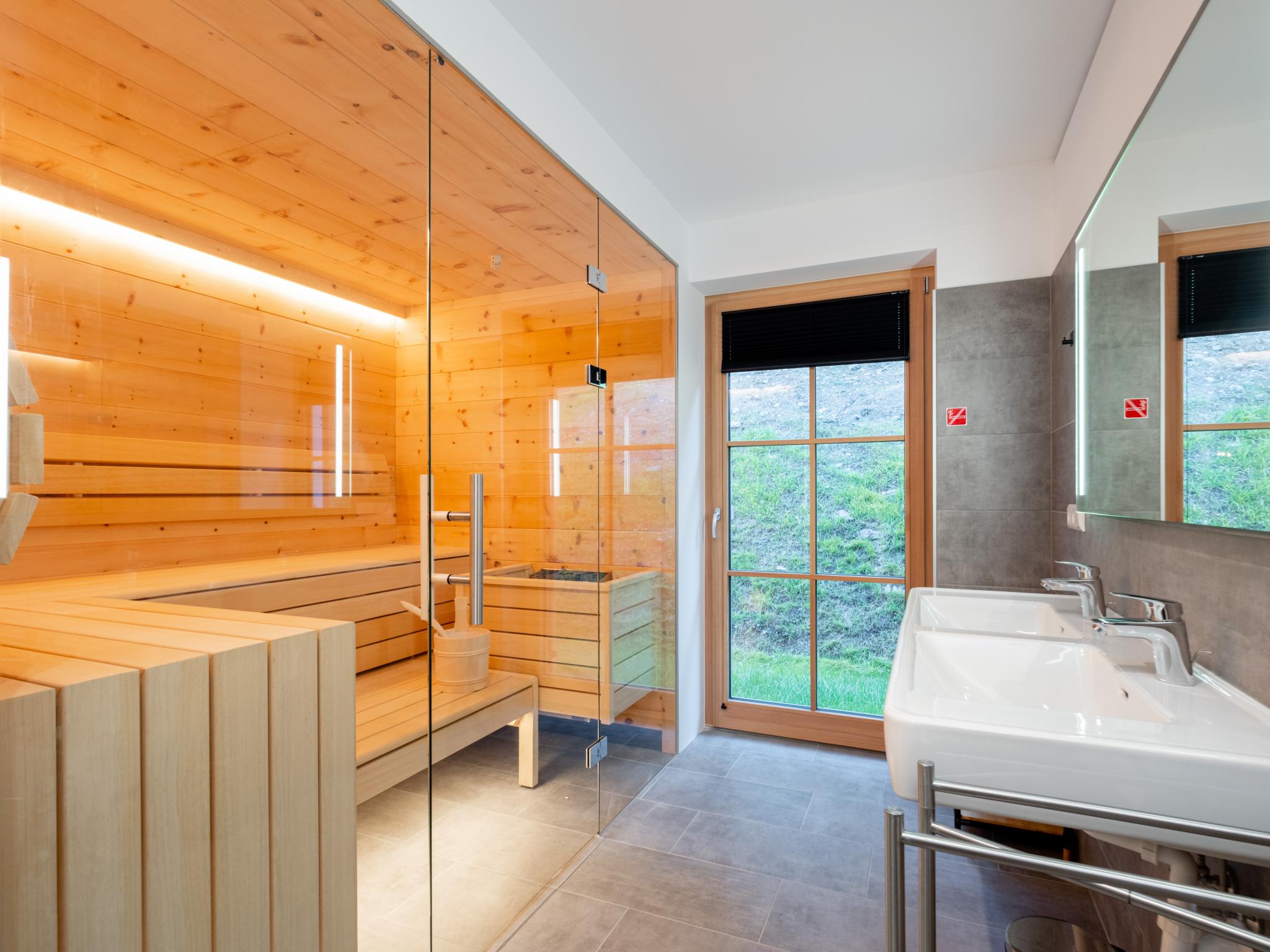 Bedroom with comfortable beds at Ahorn Mountainlodge in Donnersbachwald
