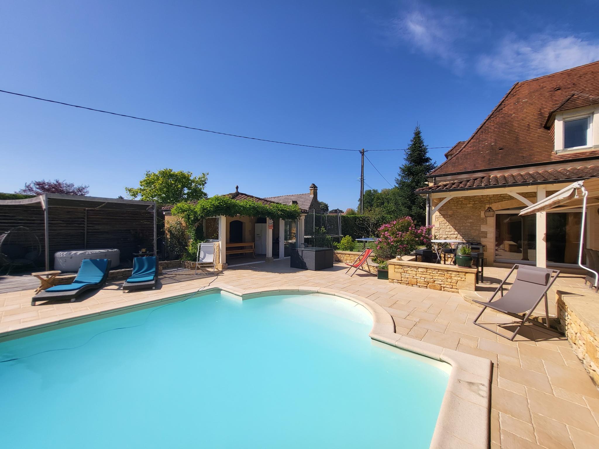 Bedroom with comfortable beds at La Grange Sud in Carsac Aillac