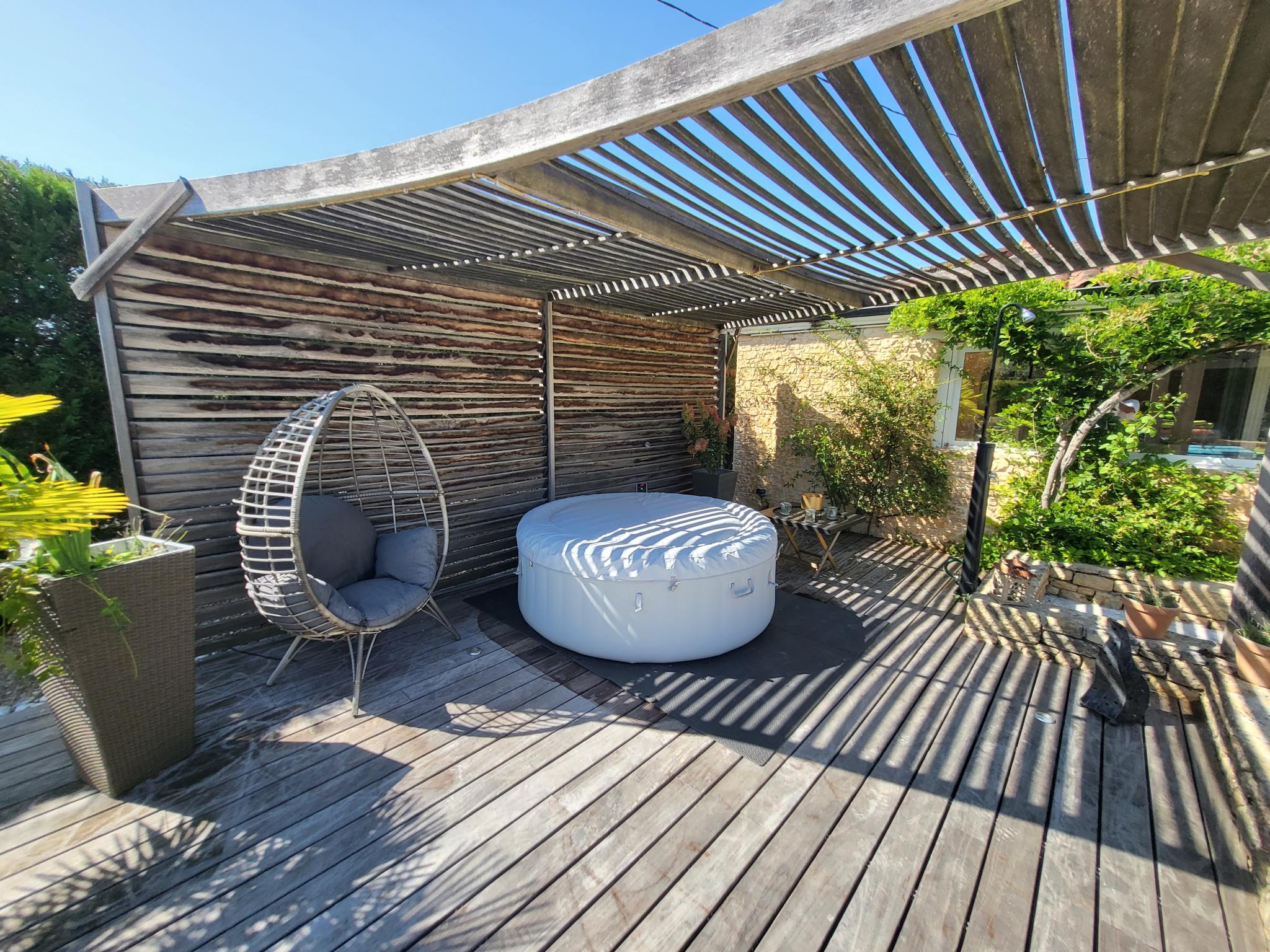 Swimming pool area at La Grange Sud in Carsac Aillac