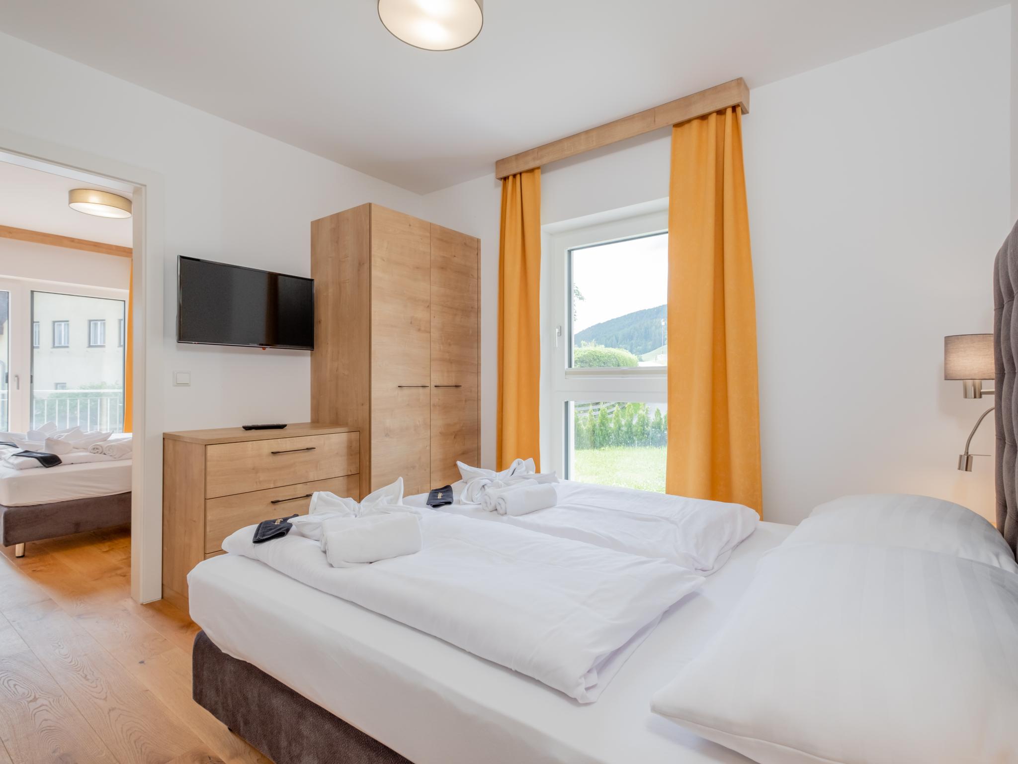 Bedroom with comfortable beds at Ski Nature Apartment Lungau Top 2 in Mauterndorf