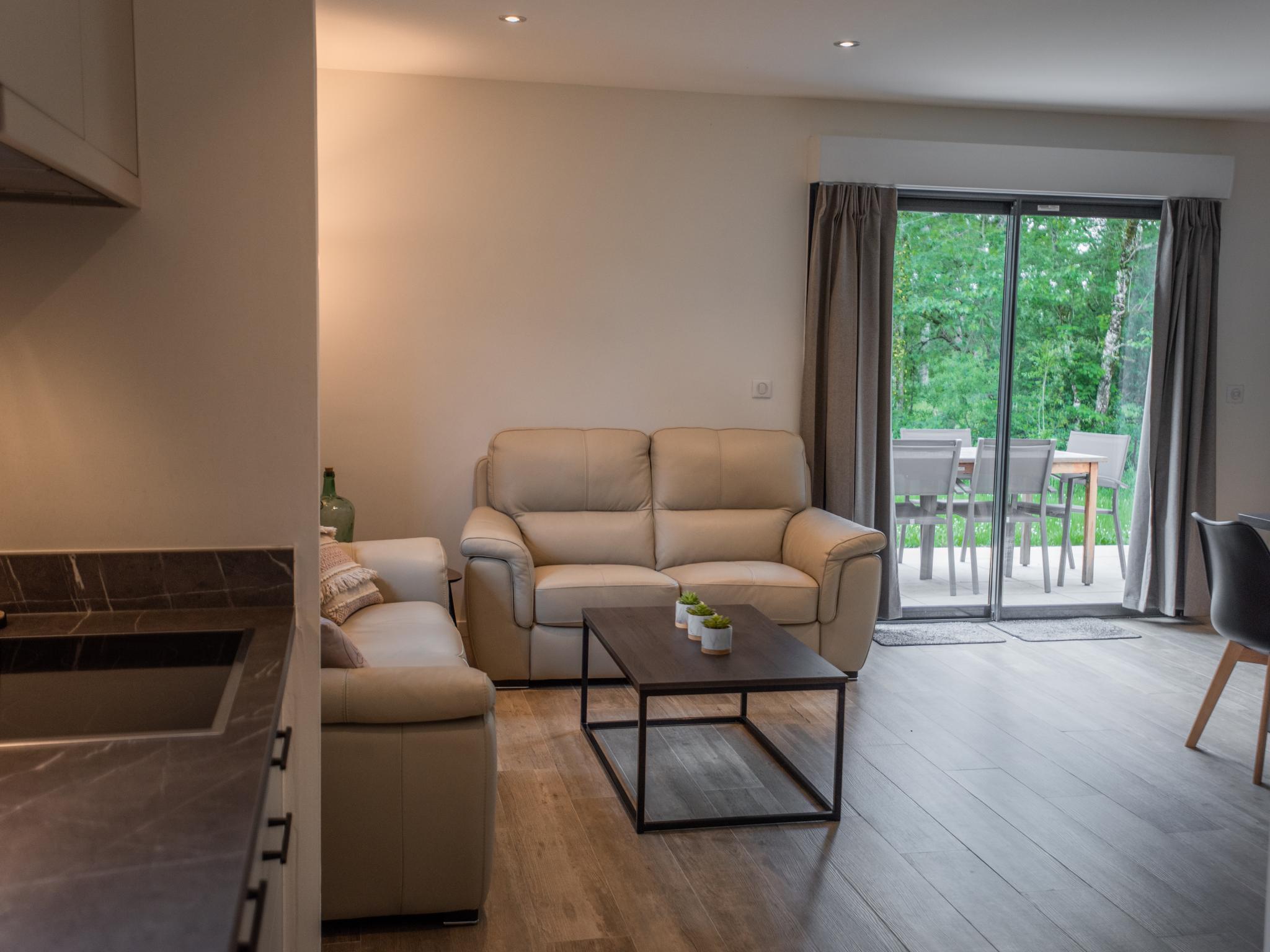 Outdoor terrace and views at Le Lac Bleu 22 in Lacapelle Marival