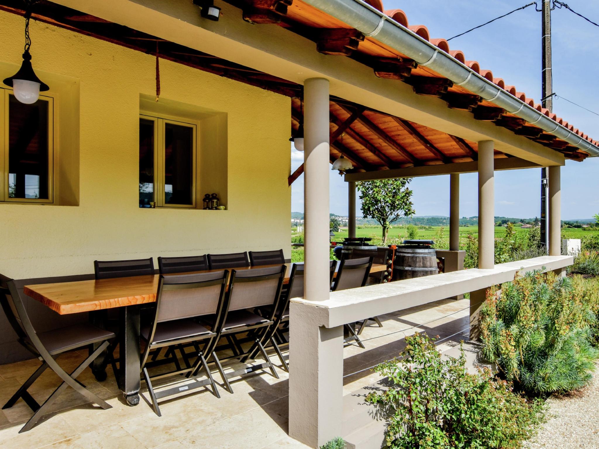 Outdoor terrace and views at Les Poujols 6 Pers in Vire sur Lot