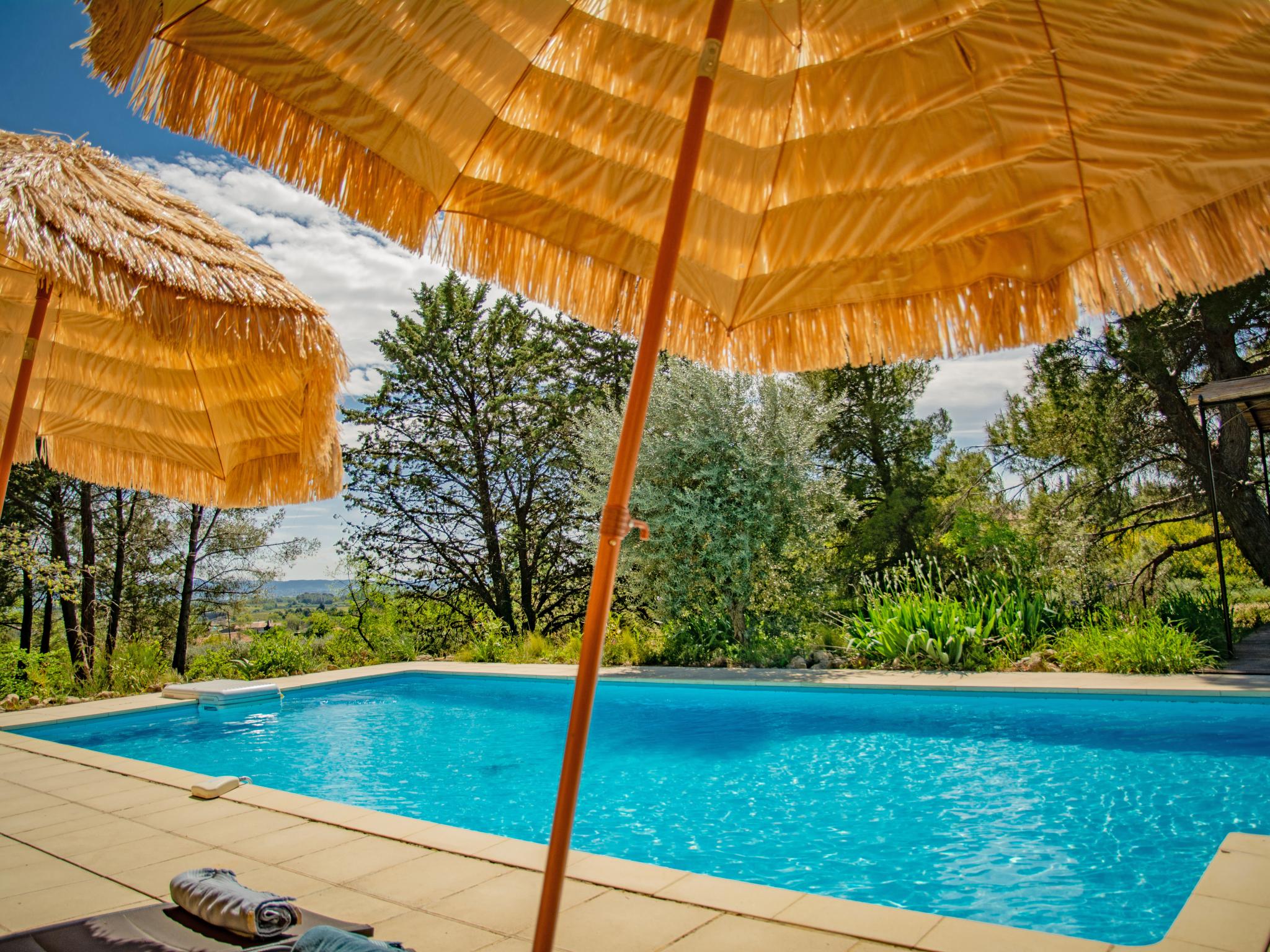 Swimming pool area at Villa Cantirane in Saint-Pierre-de-Vassols