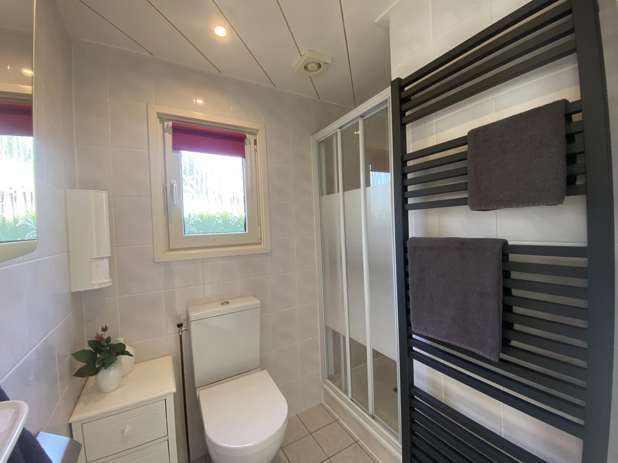 Outdoor terrace and views at Vakantiehuis Das in Hulshorst