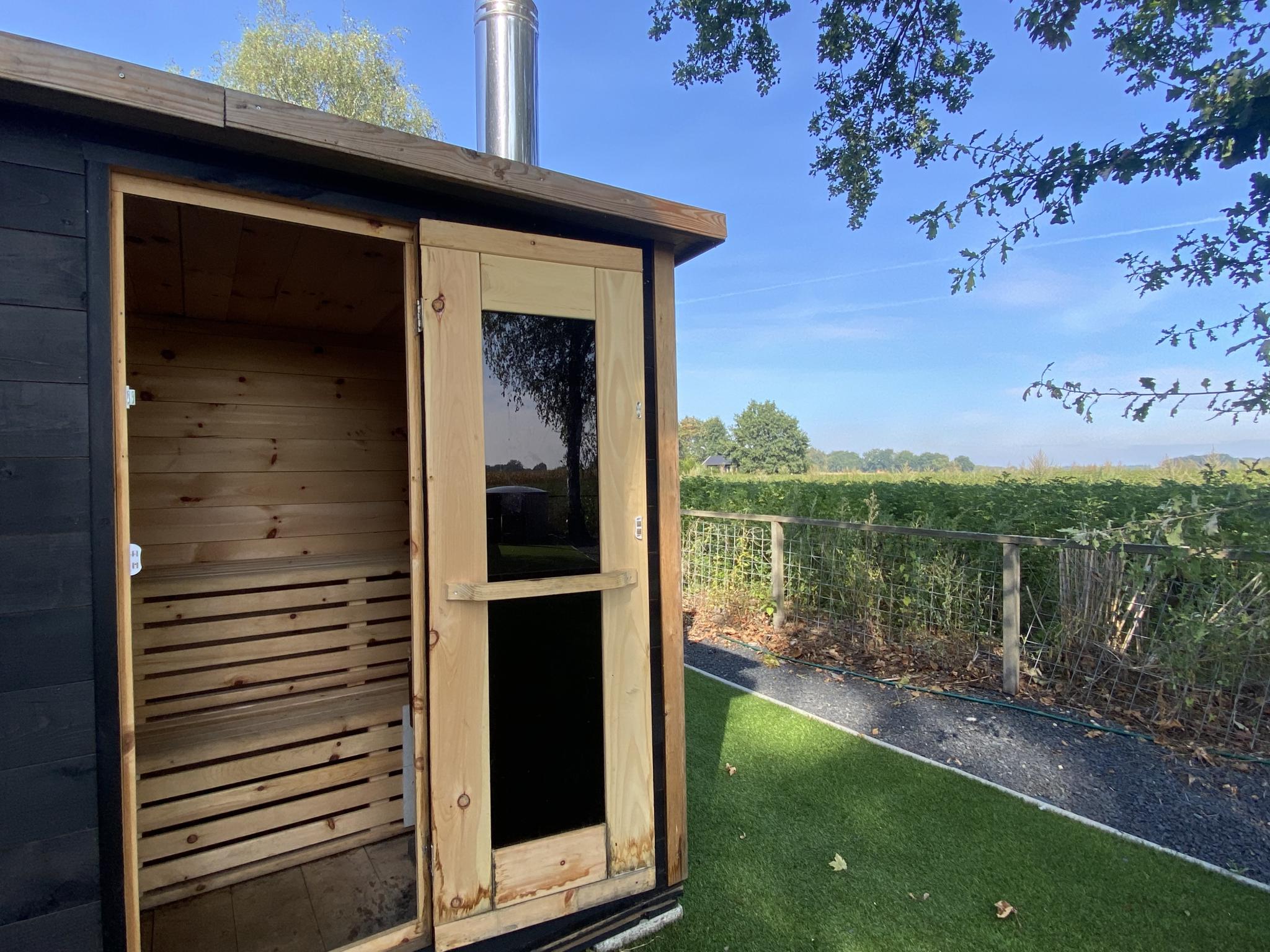 Outdoor terrace and views at De Kolibrie in Garderen