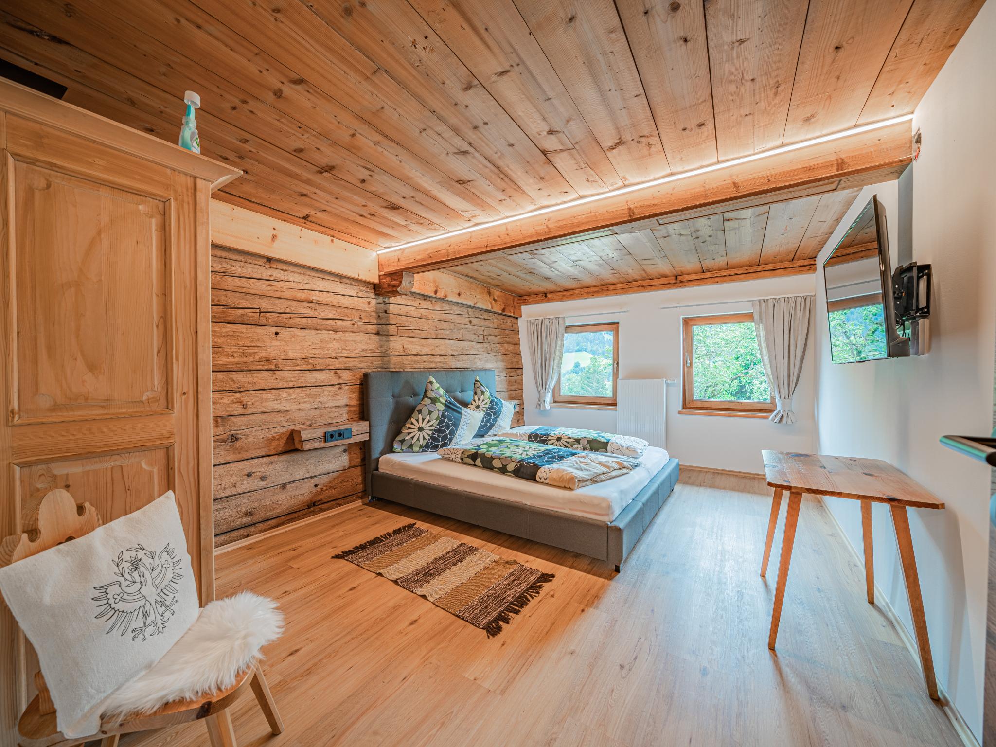 Bedroom with comfortable beds at Hohe Salve L in Hopfgarten im Brixental