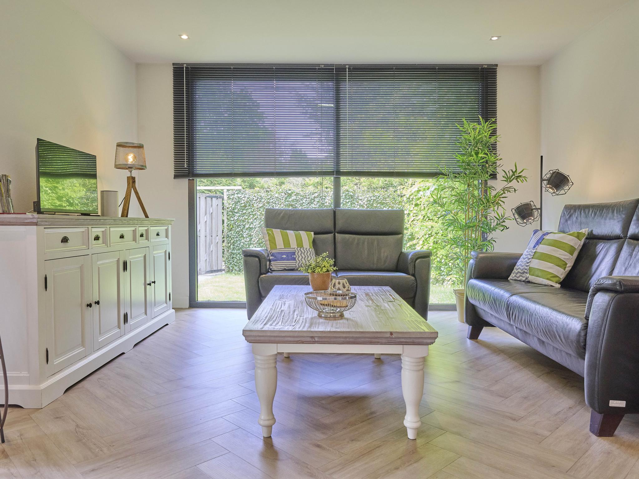 Bedroom with comfortable beds at De Veluwse houtduif in Garderen