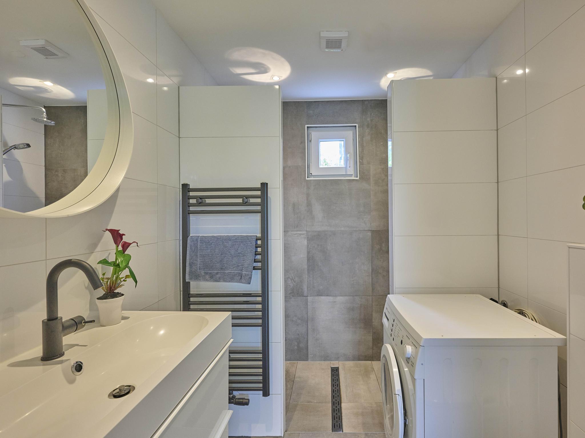 Swimming pool area at De Veluwse houtduif in Garderen