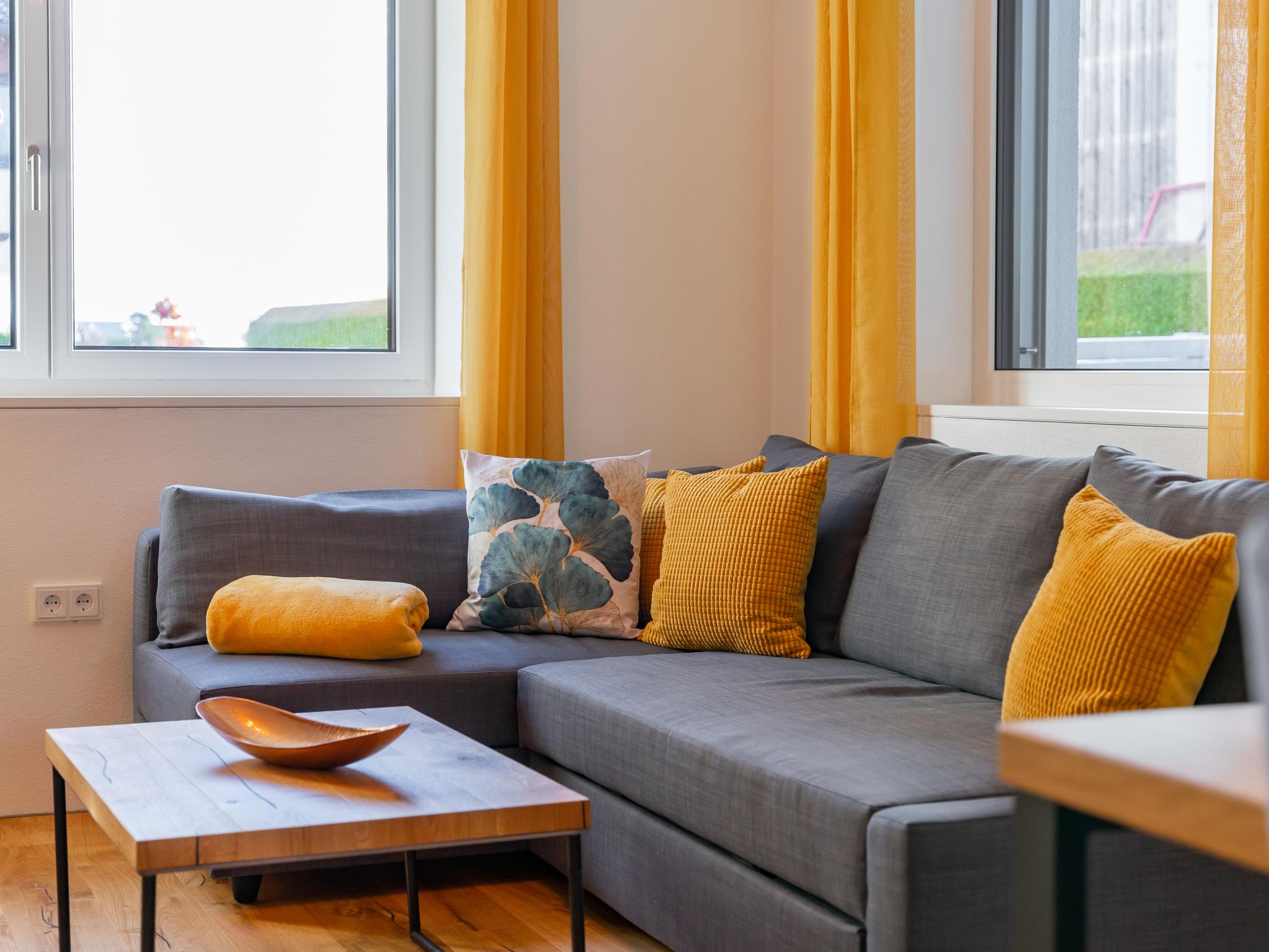 Bedroom with comfortable beds at Ferienwohnung Emilia in Niedernsill