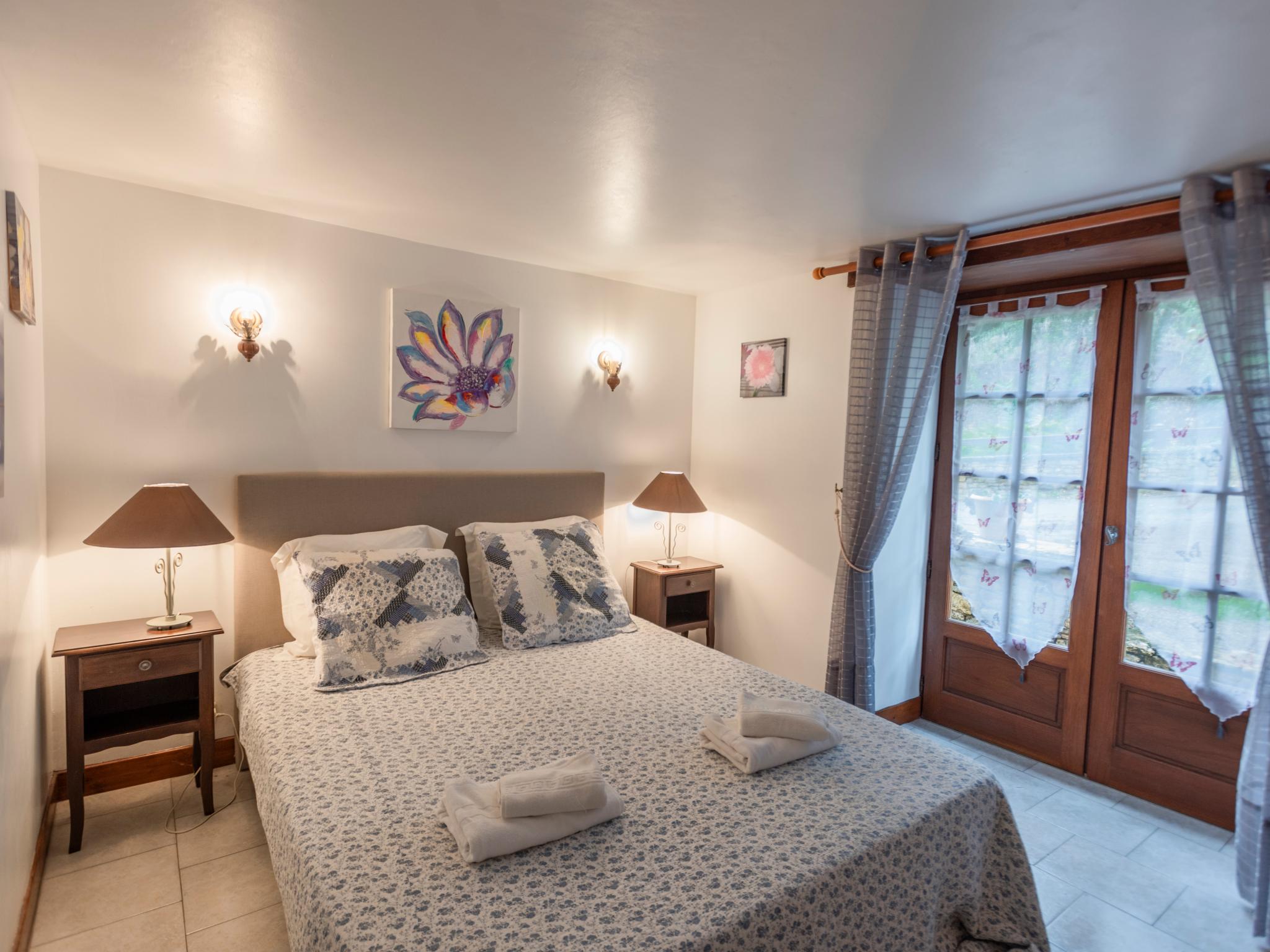 Outdoor terrace and views at Gite Le Croix du Notaire in Prats du Perigord