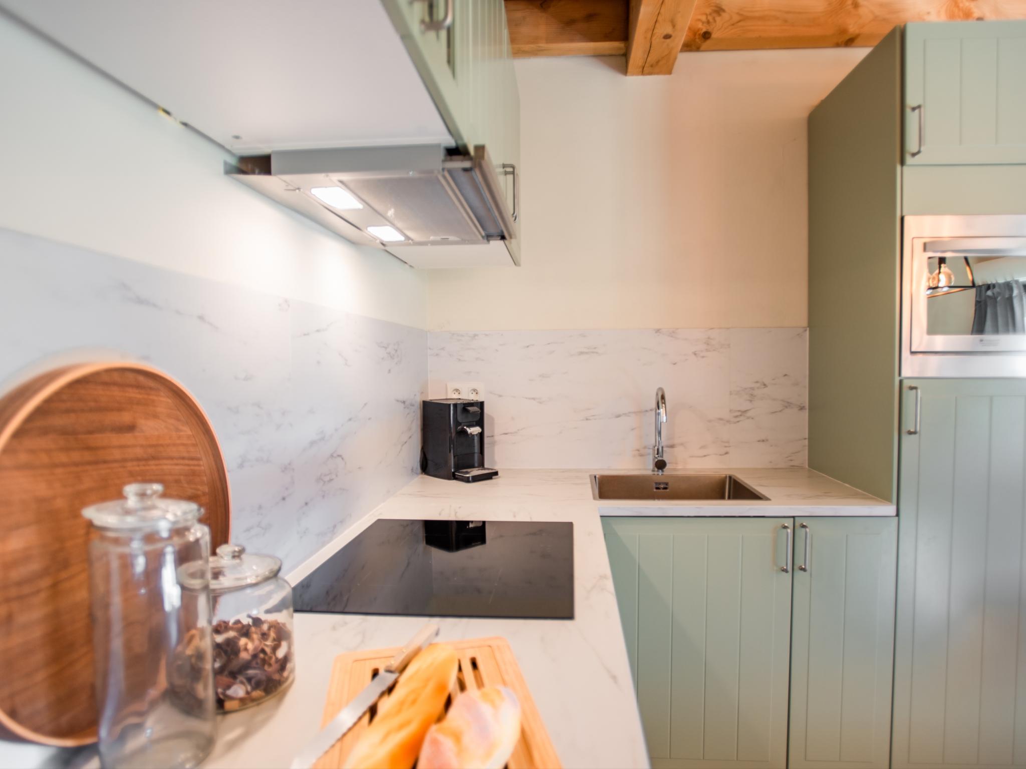 Modern kitchen at Le Lac Bleu nr 27 in Lacapelle Marival