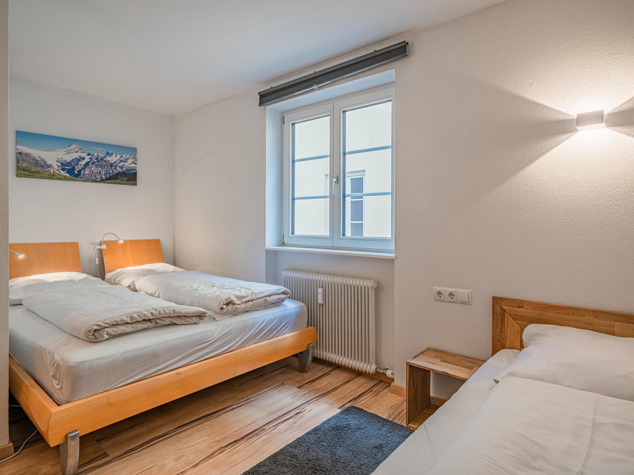 Bedroom with comfortable beds at Apartment Gorilla in Hopfgarten im Brixental